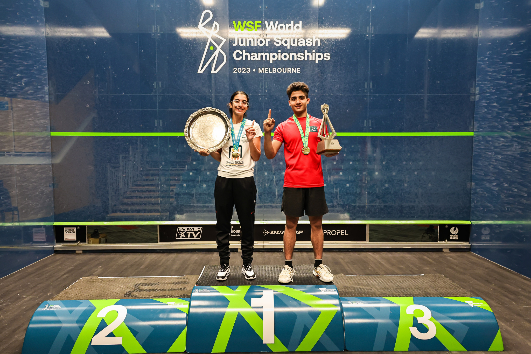 Egypt’s Amina Orfi, left, and Pakistan's Hamza Khan, right, won the respective women's and men's singles titles in Melbourne ©WSF