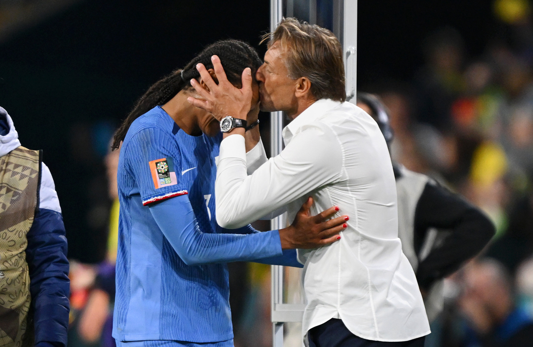 French coach Hervé Renard celebrates with Wendie Renard after she scores France's winner against Brazil ©Getty Images