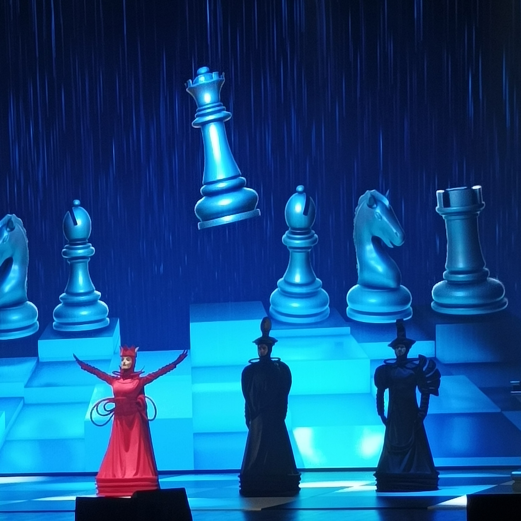 Virtual chess pieces form a backdrop for the Red Queen during a dance performance at FIDE World Cup Opening Ceremony in Baku ©ITG