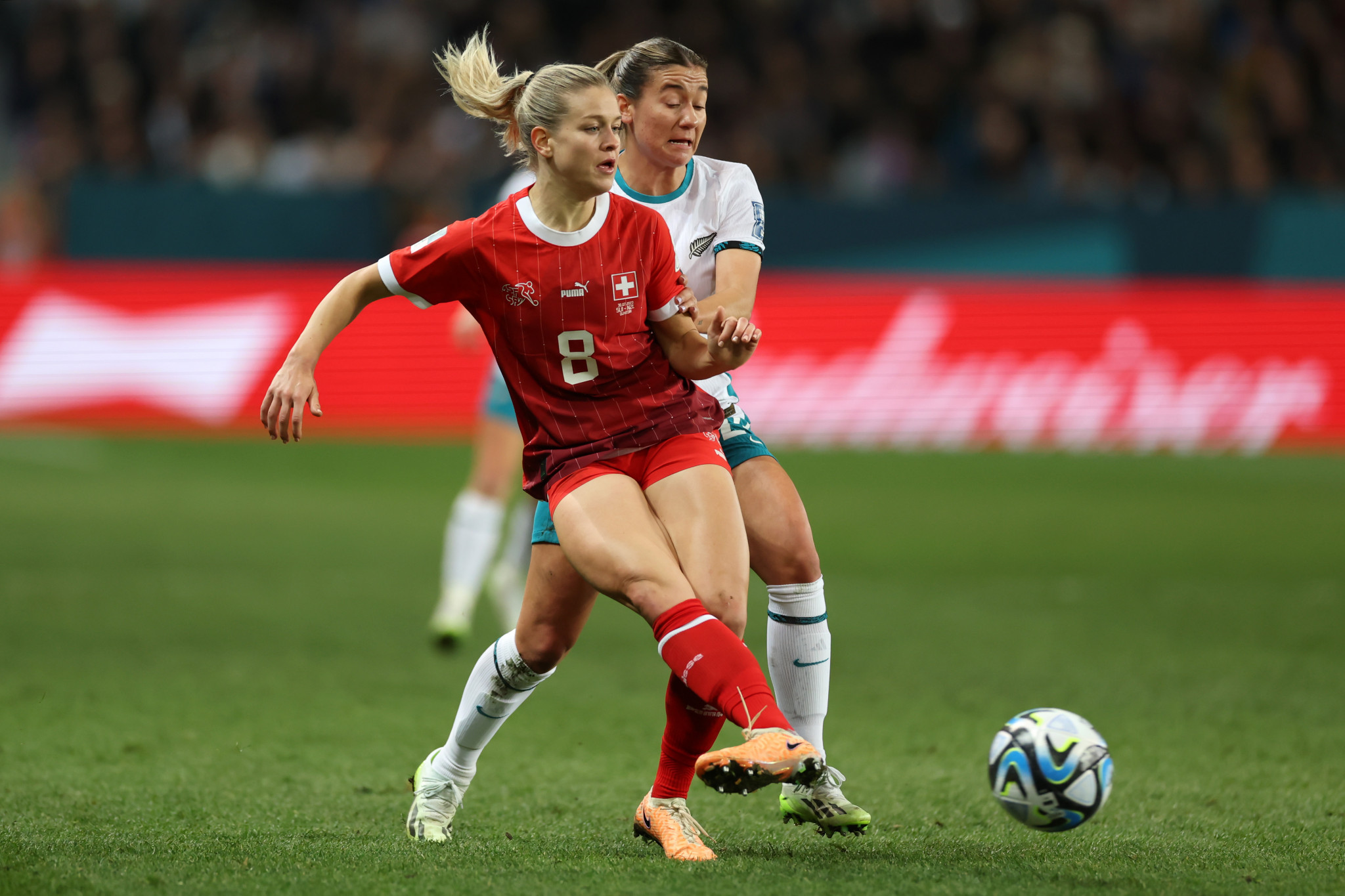 Switzerland, playing in red, earned a battling goalless draw against co-hosts New Zealand to finish top of Group A ©Getty Images