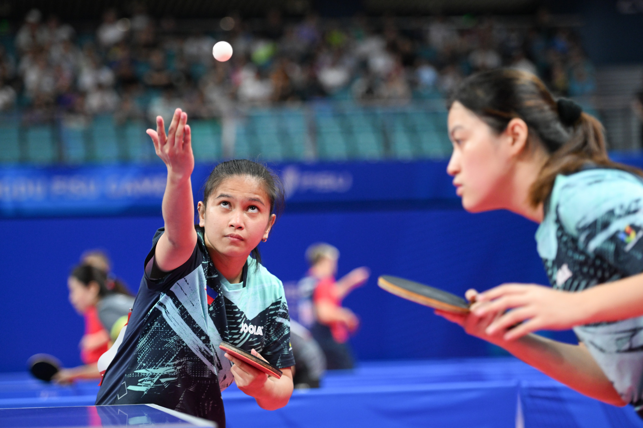 The Philippines are fully focused during their women's doubles table tennis match ©FISU