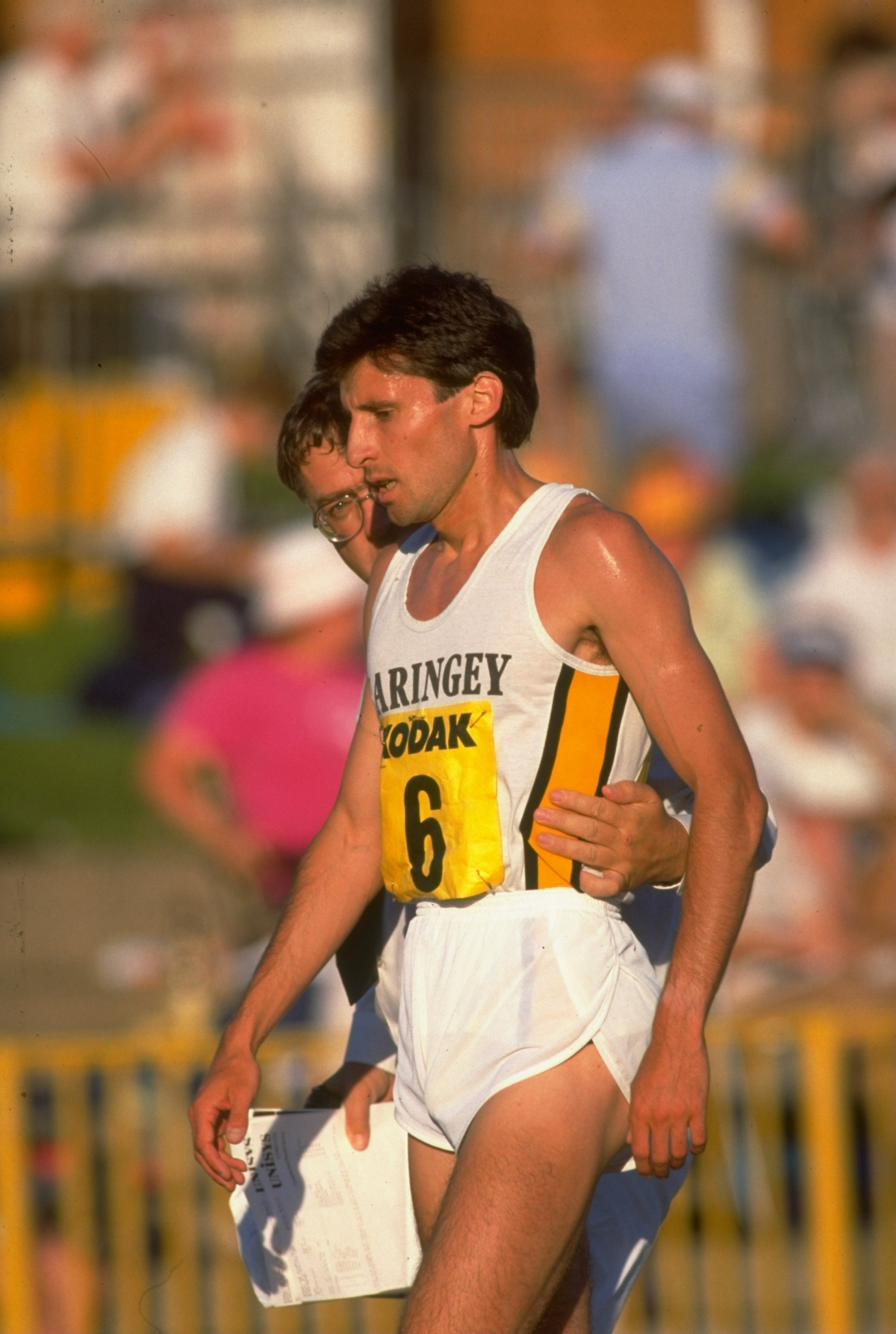Double Olympic 1500m champion Sebastian Coe is consoled after being knocked out in the heat of the British Olympic trials for Seoul 1988 ©Getty Images