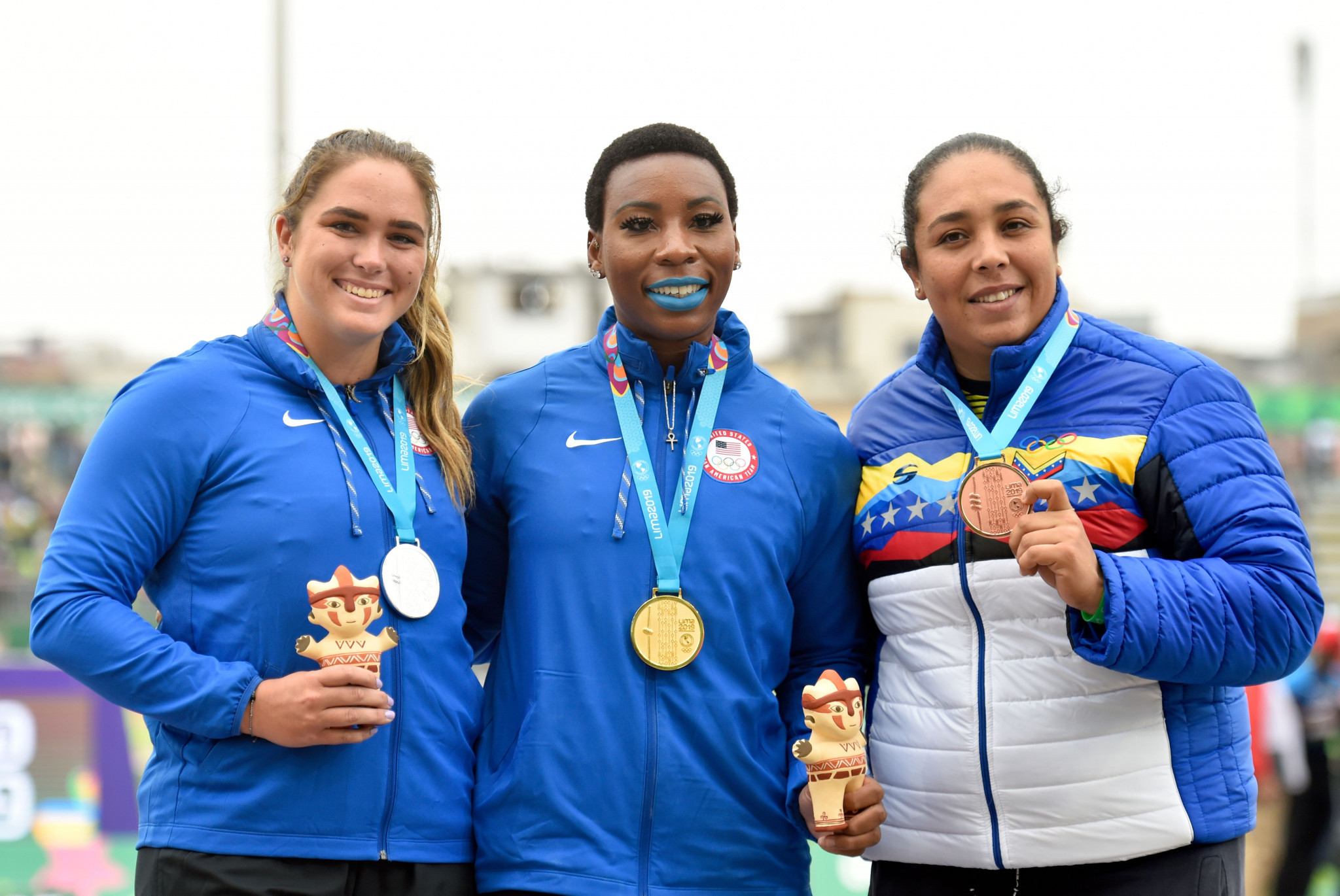 Gwendolyn Berry, centre, won hammer throw gold at the Lima 2019 Pan American Games ©Getty Images