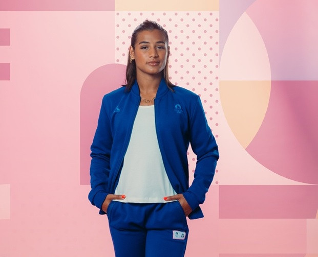 French gymnast Marine Boyer models the Le Coq Sportif and Paris 2024-branded jacket and trousers ©Paris 2024