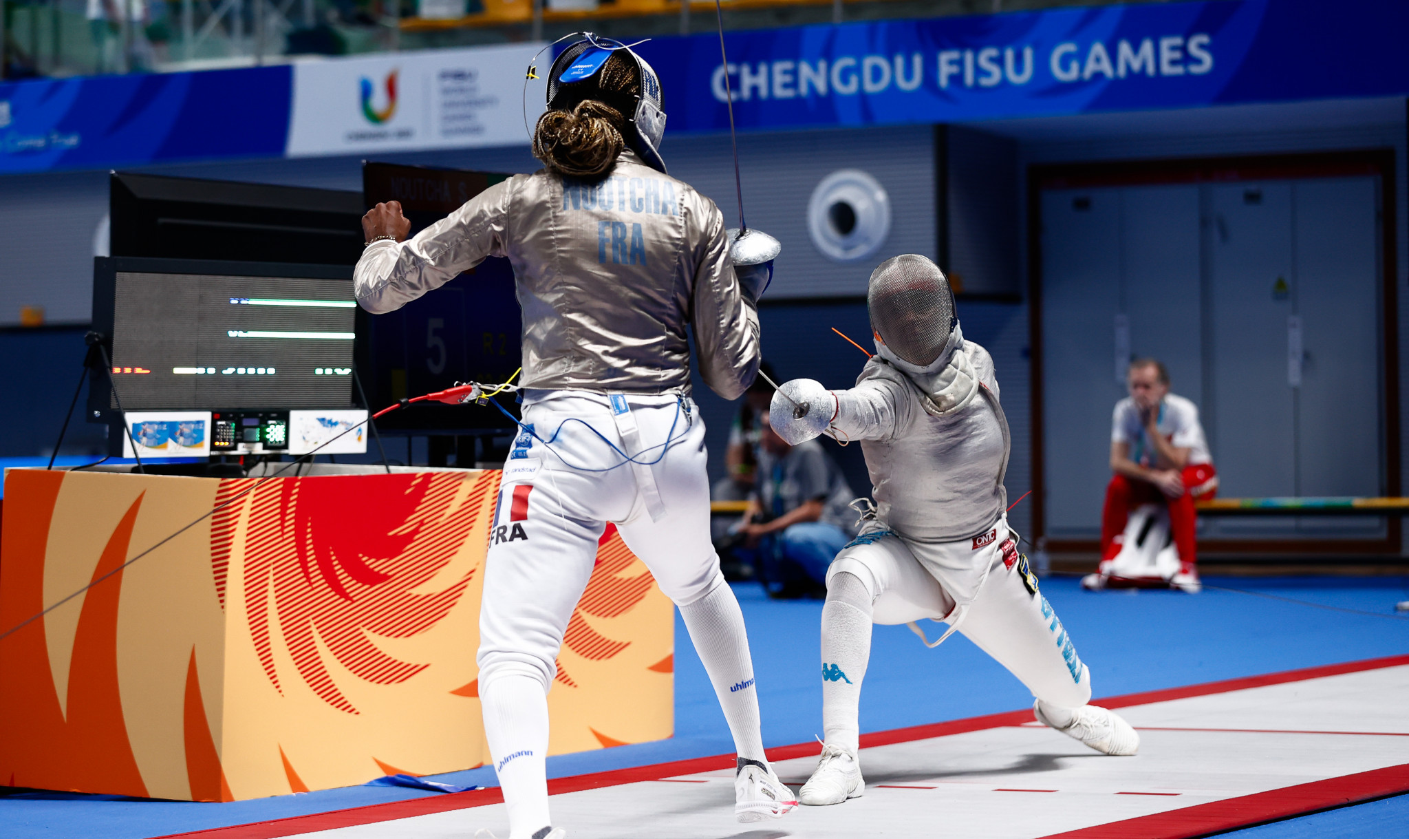 Rebecca Gargano, right of Italy and Sarah Camille Noutcha of France during the women's sabre quarter-finals ©Chengdu 2021
