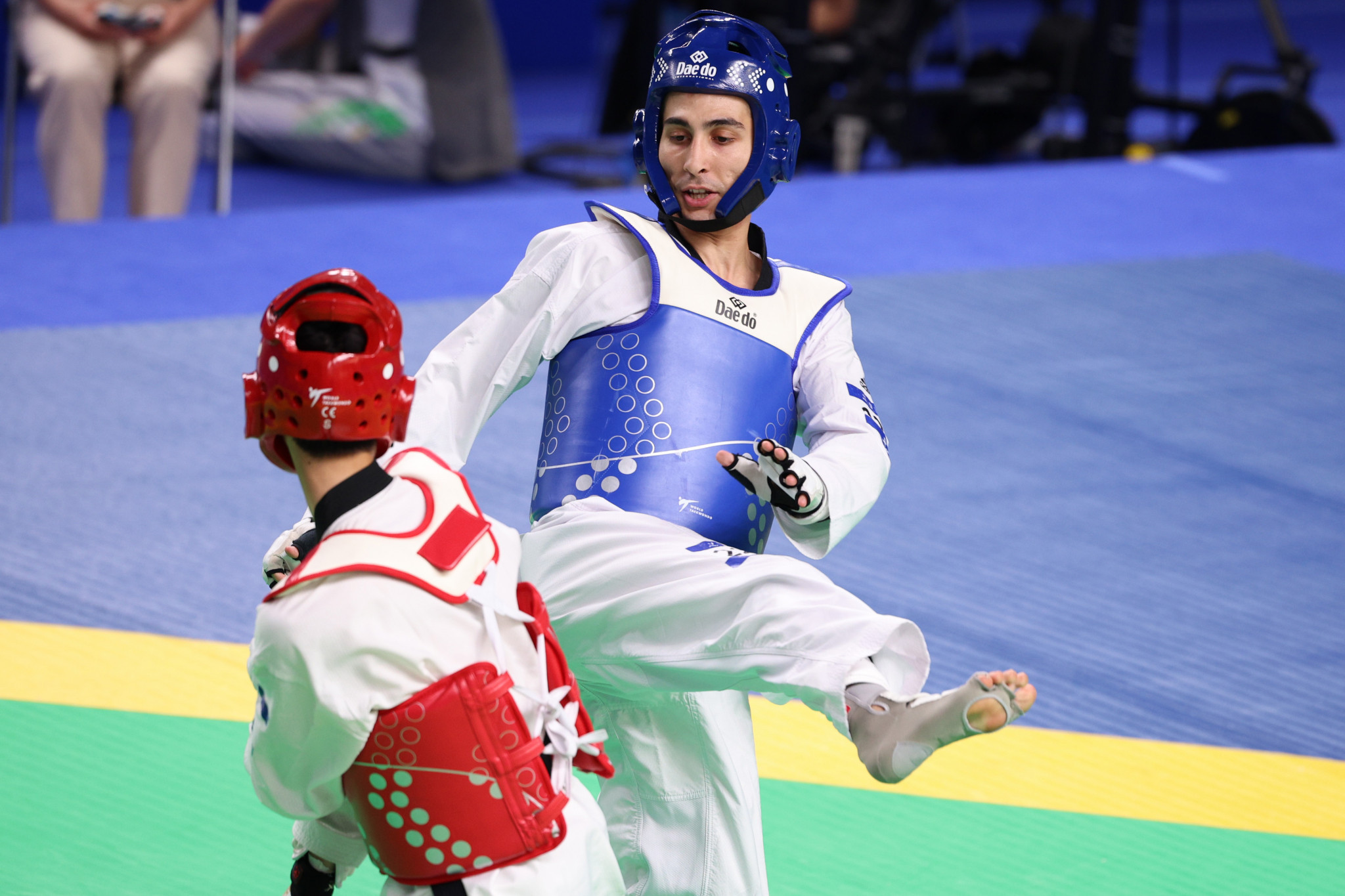 Hakan Recber of Turkey, right, came out on top in the men's under-63kg taekwondo competition ©Chengdu 2021