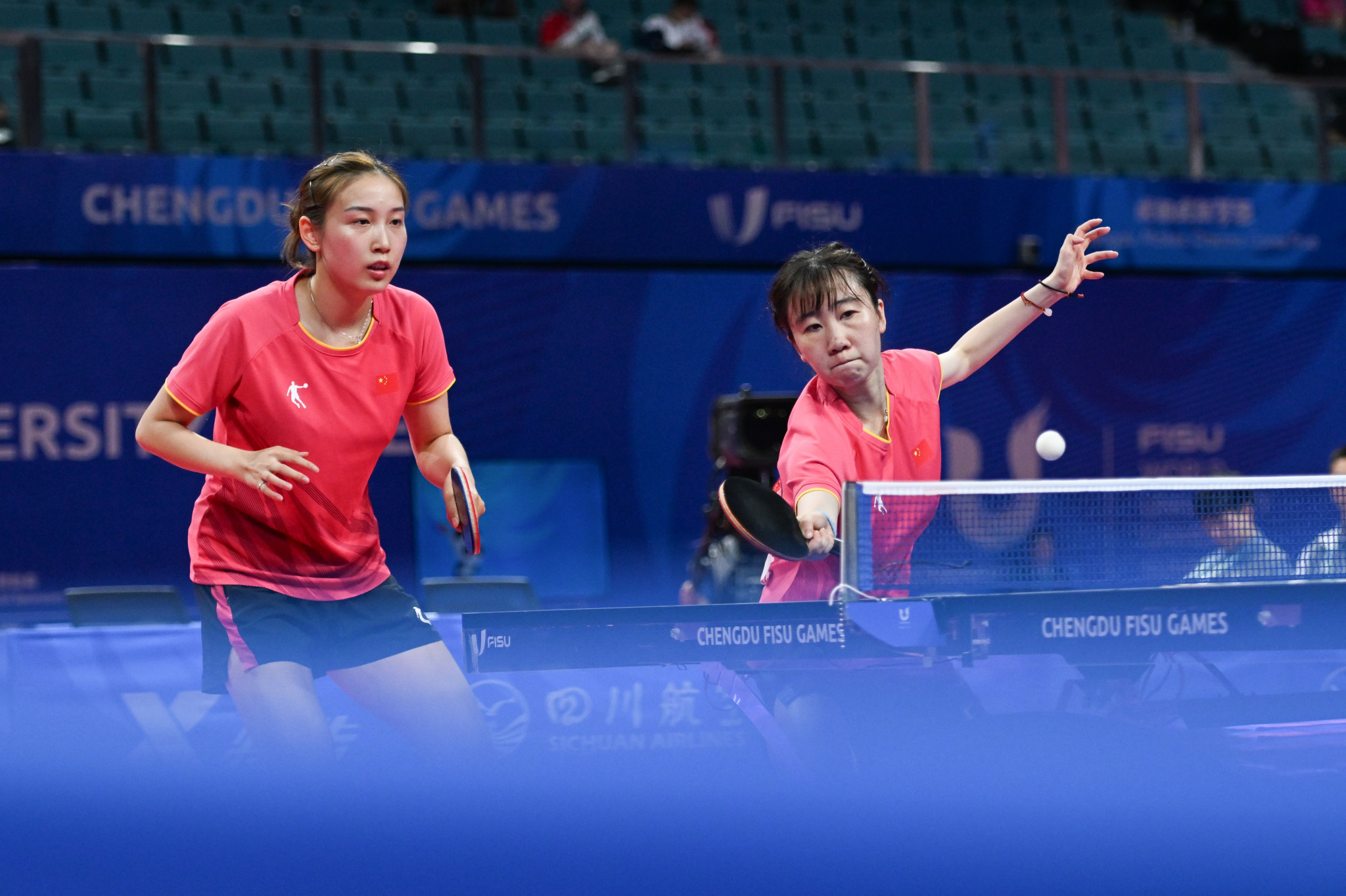 Qiang Tianyi and Zhao Shang won the women's doubles crown on another successful day for hosts China ©FISU