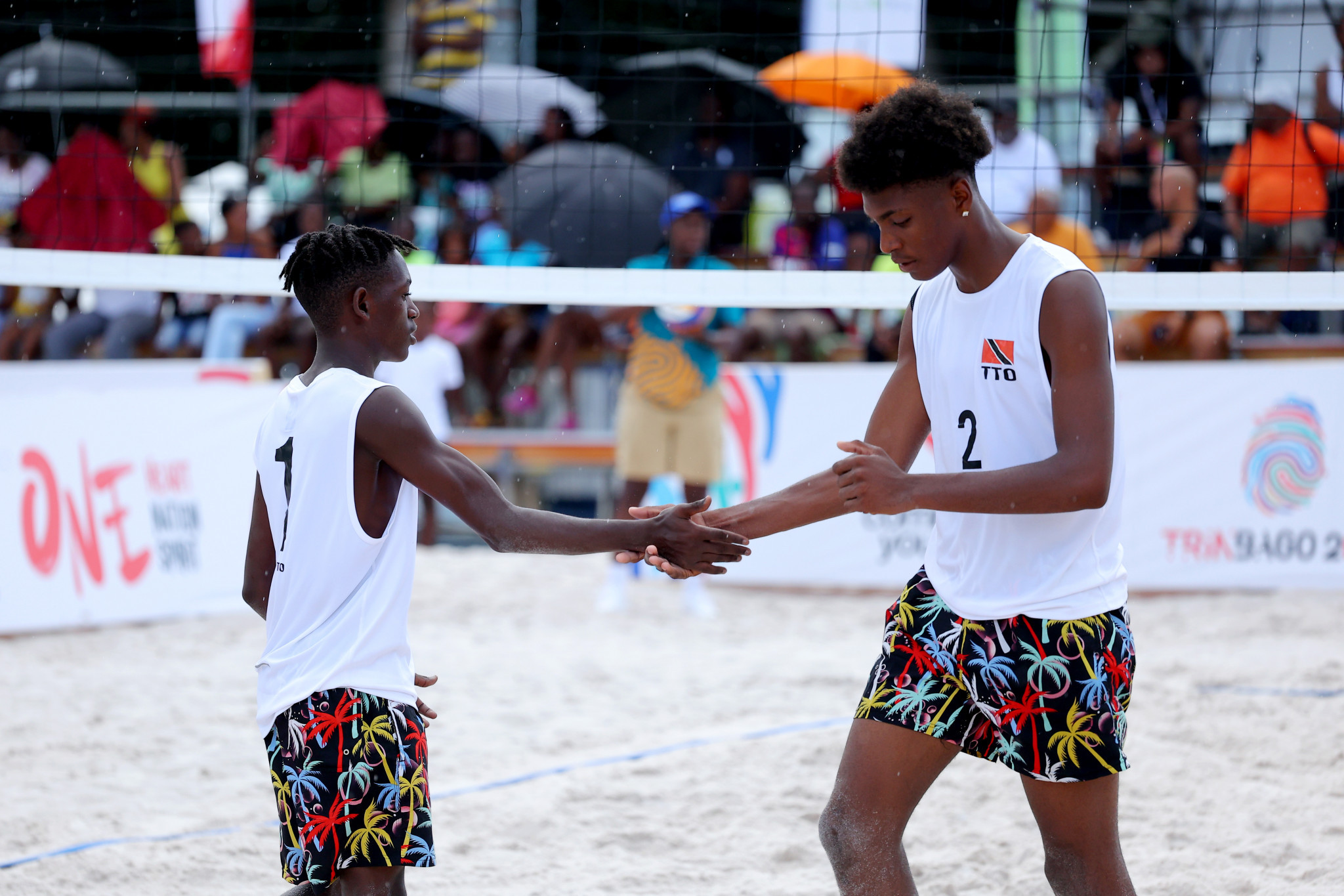 Trinidad and Tobago's Jerome Morrisson, left, and Jahreef Miguel, right, were among the winners of their opening group match in the men's beach volleyball ©Getty Images