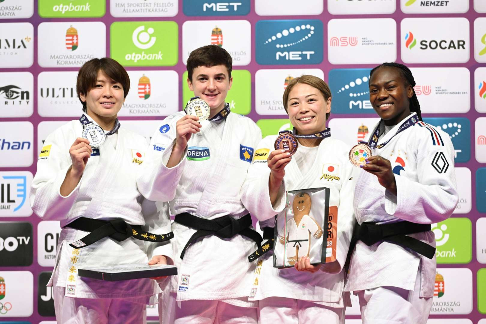 Kosovo's Laura Fazliu, second left, improved on last year's Judo World Masters silver with gold in Hungary ©IJF