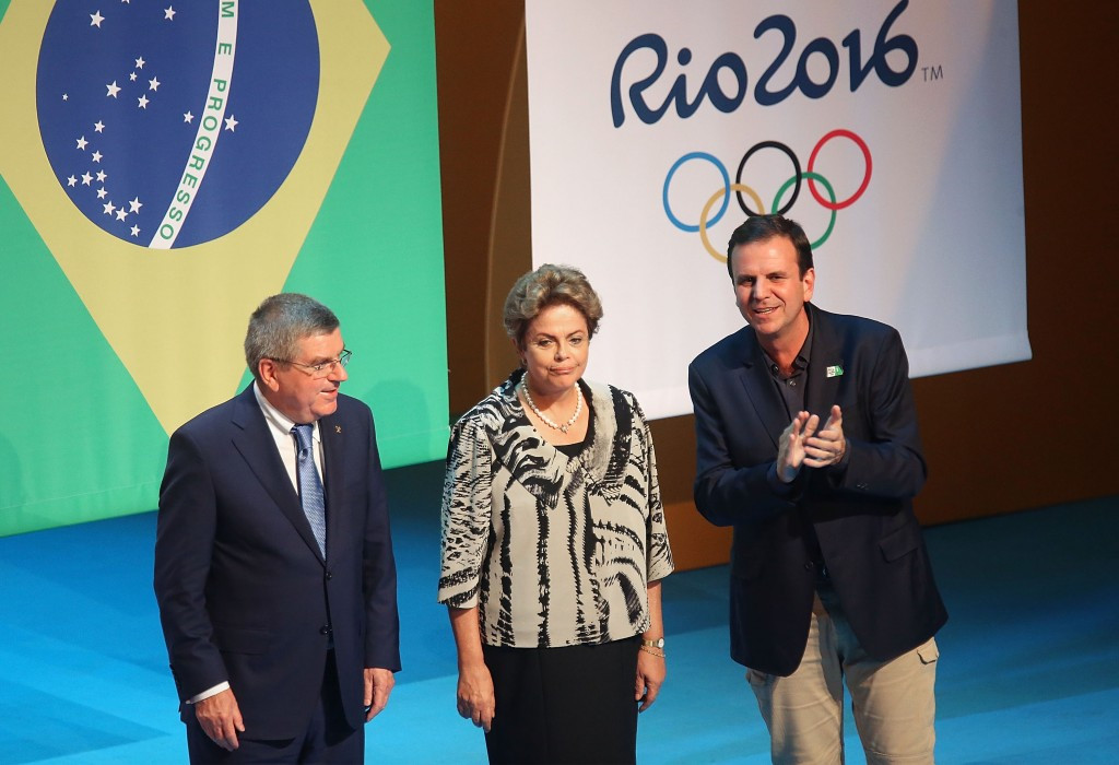 IOC President Thomas Bach, Brazilian President Dilma Rousseff and Rio Mayor Eduardo Paes attending one year to go celebrations at the Cidade des Artes last year ©Getty Images