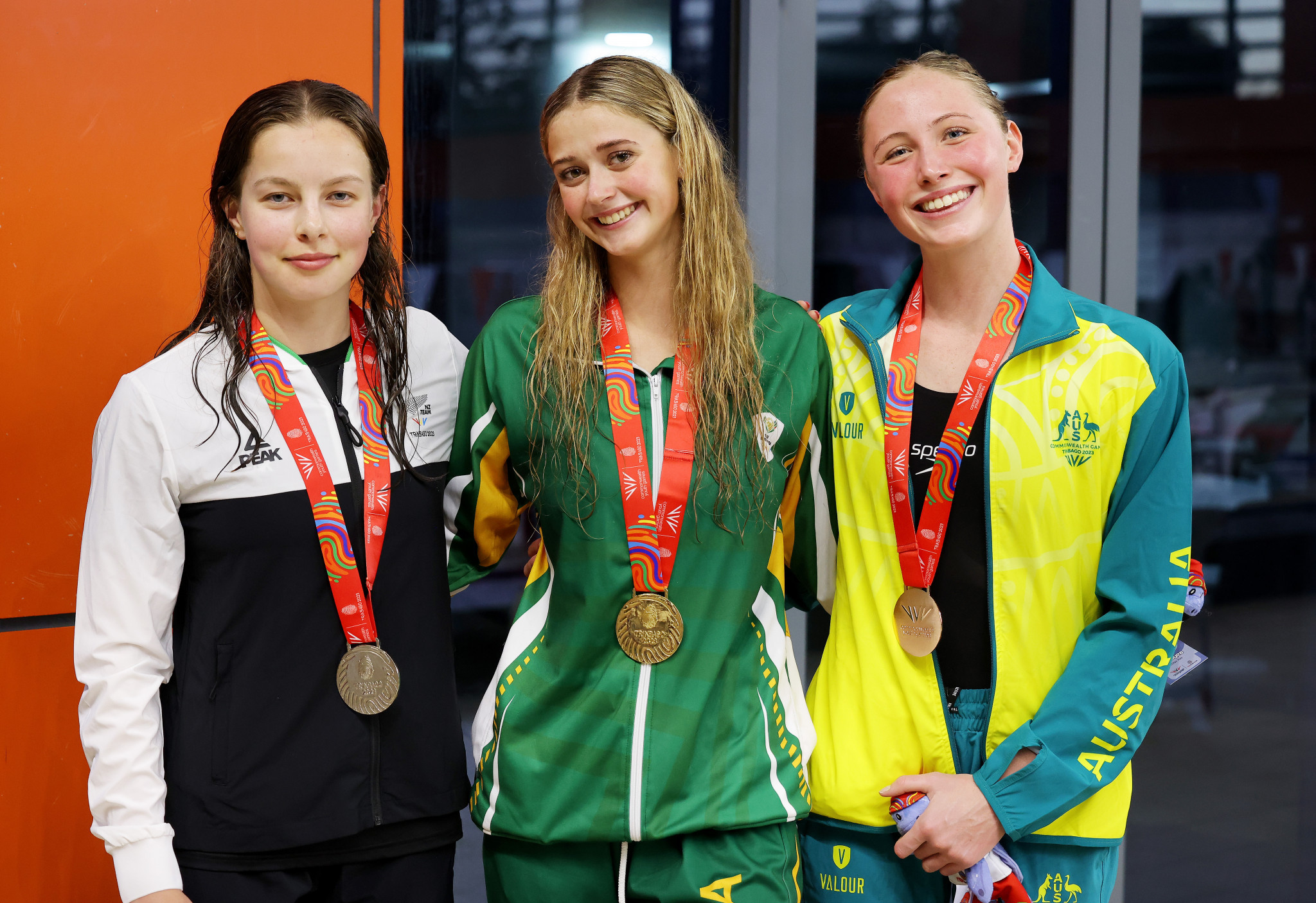 South Africa's Jessica Thompson, centre, won the women's 50m butterfly final in a Commonwealth Youth Games record of 26.84sec ©Getty Images