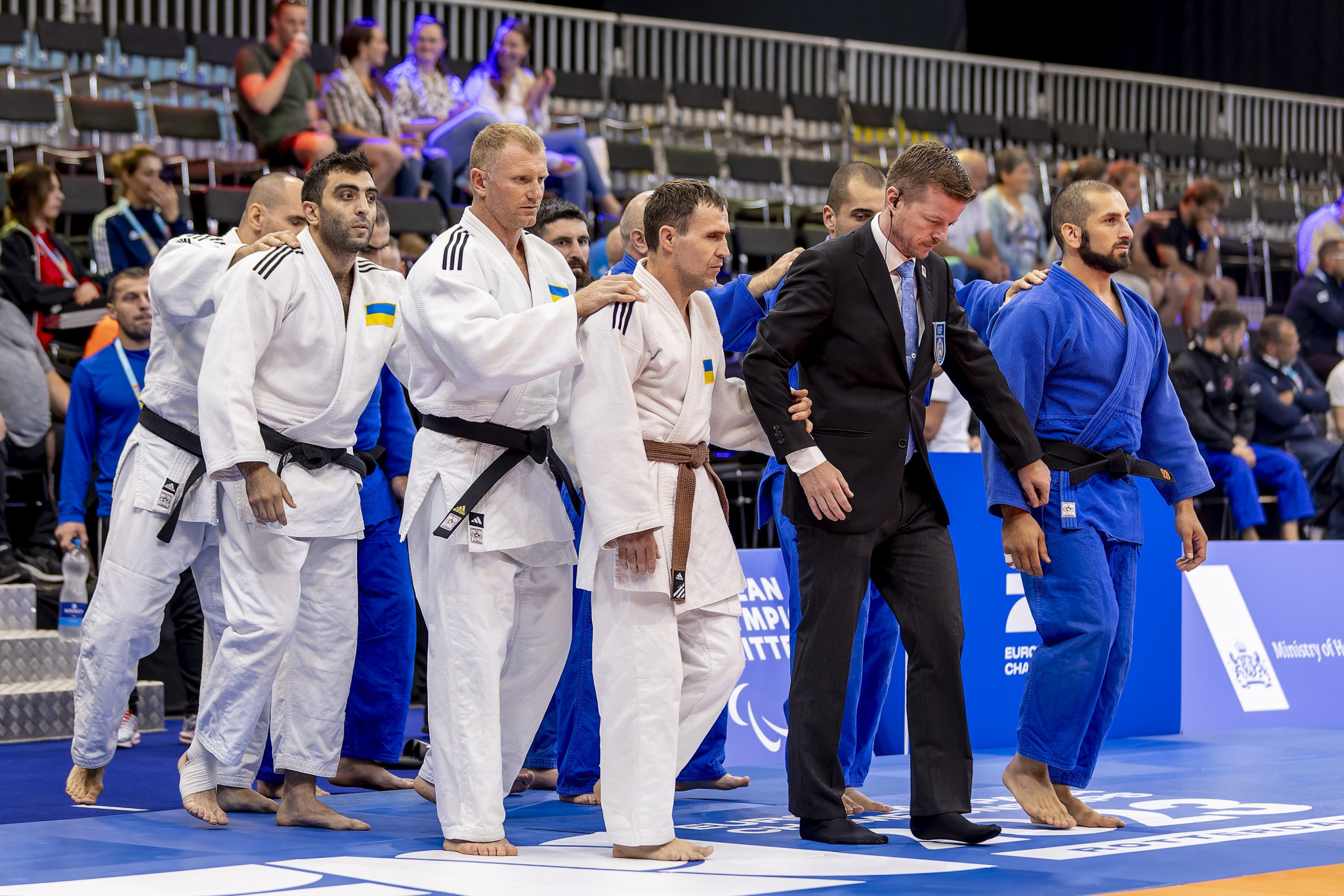 Para judo teams were led out before doing battle across the two tatamis ©EPC