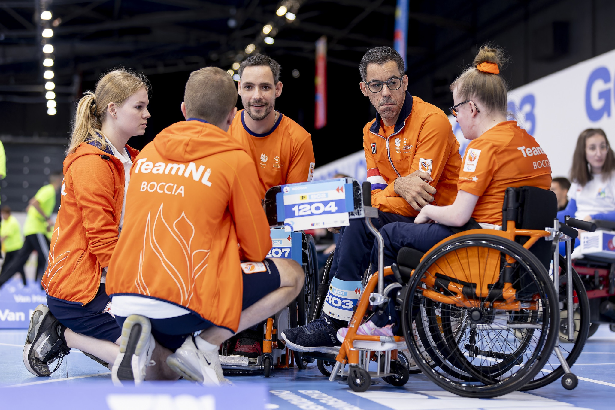 Dutch boccia players come together for a team meeting during today's competition ©EPC