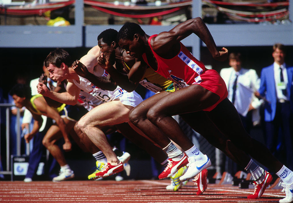 Carl Lewis of the United States pictured nearest camera at the first World Athletics Championships of 1983 in Helsinki contesting the 100m - one of three events in which he won gold ©Getty Images