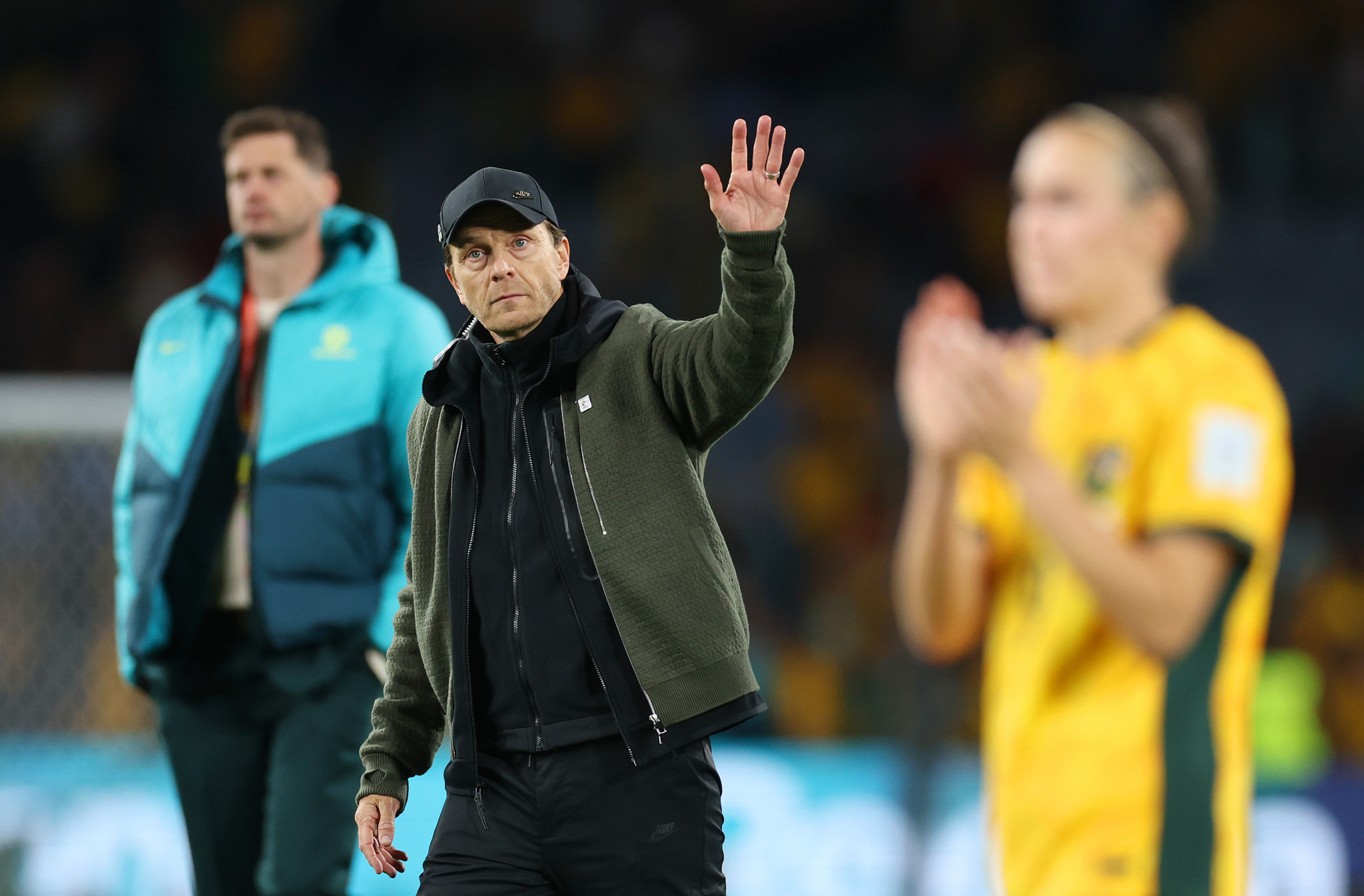 Australia coach Tony Gustafsson salutes the home fans as the Matildas are beaten in the semi-finals ©Getty Images