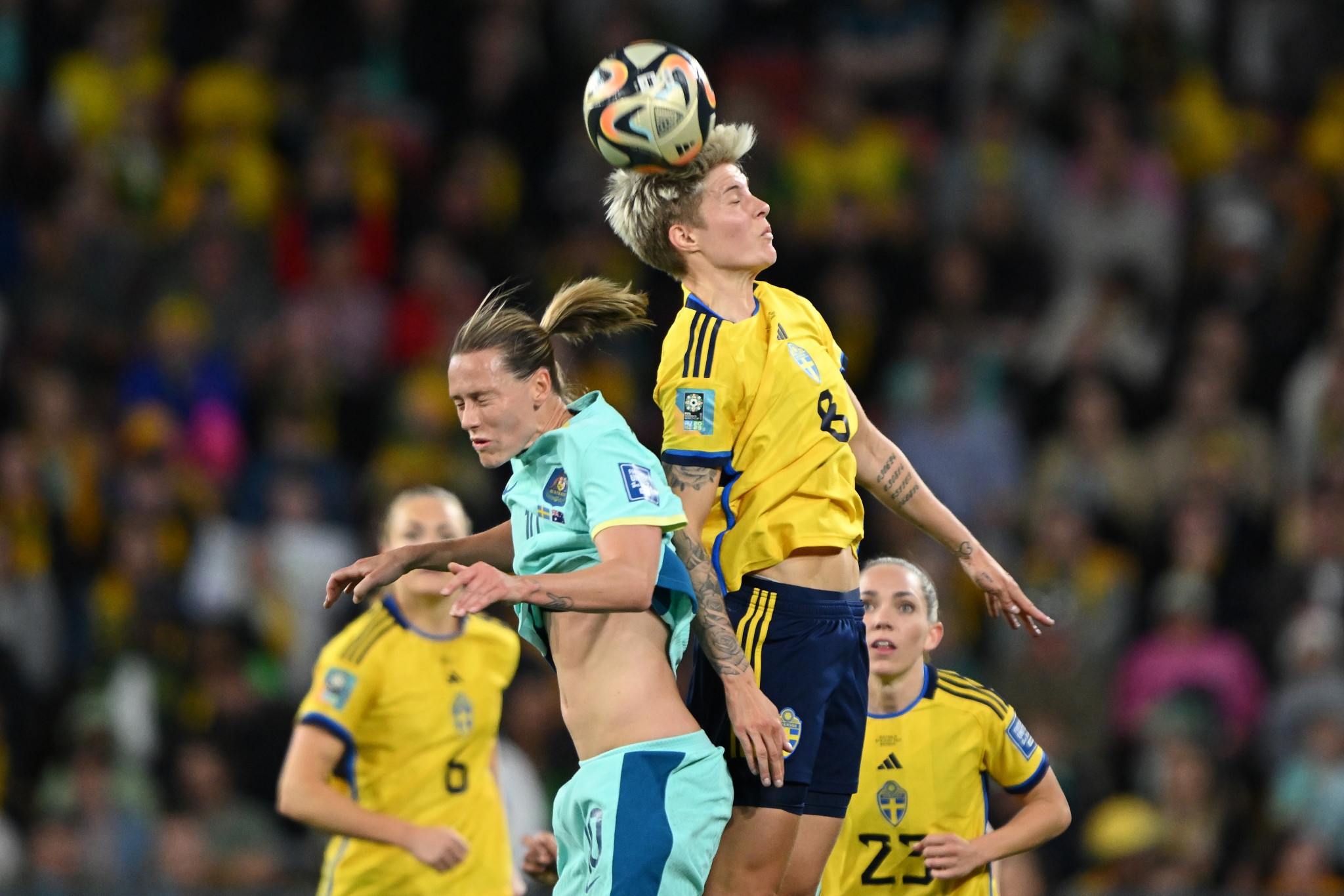 Sweden's Lina Hurtig, right, challenges Australia's Emily Van-Egmond for the ball during the third place match in Brisbane  ©Getty Images