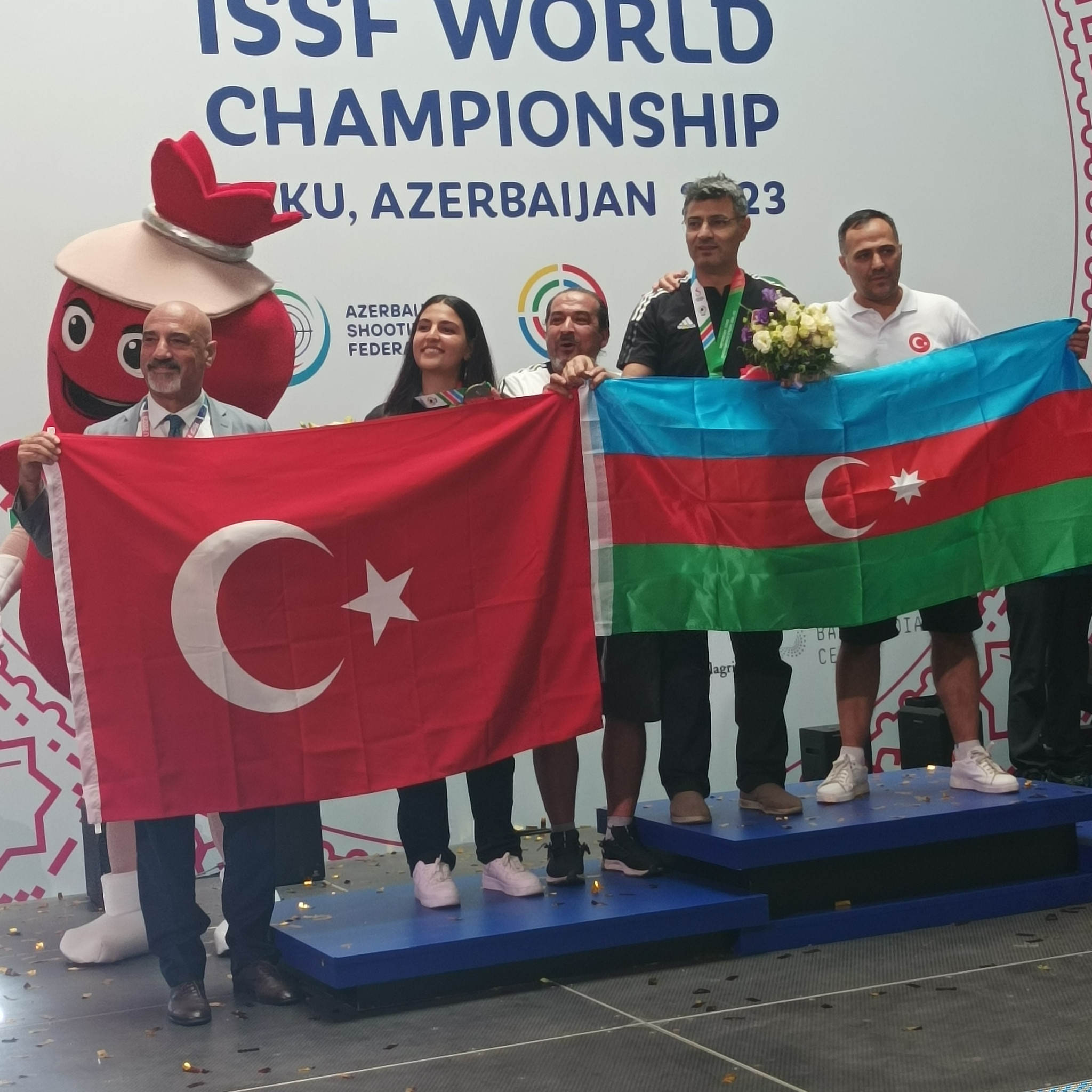 Neighbours from Turkey and Azerbaijan get together on the podium ©ITG