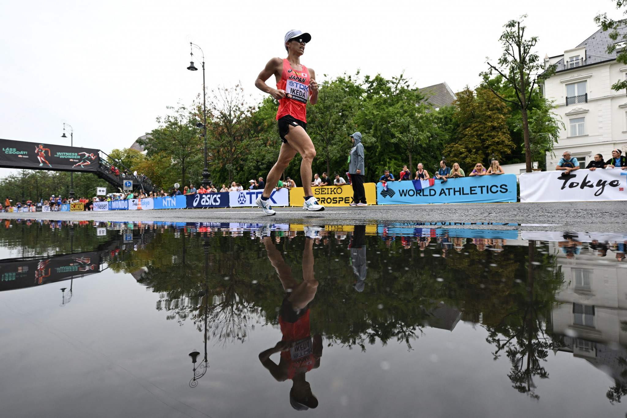 Koki Ikeda of Japan slipped away having led for much of the men's 20km race walk, which had been delayed by two hours due to thunderstorms in Budapest ©Getty Images
