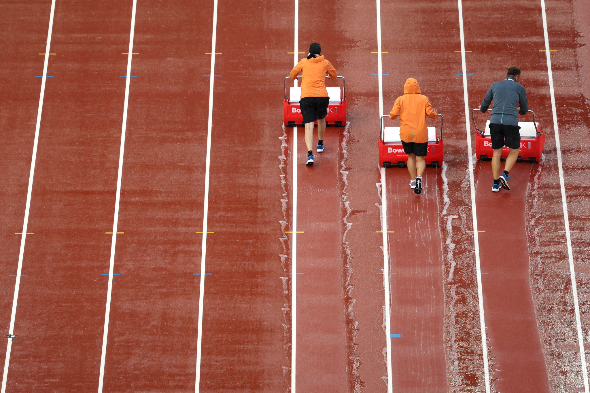 Torrential rain also led to the start of competition at the National Athletics Centre being delayed by an hour ©Getty Images