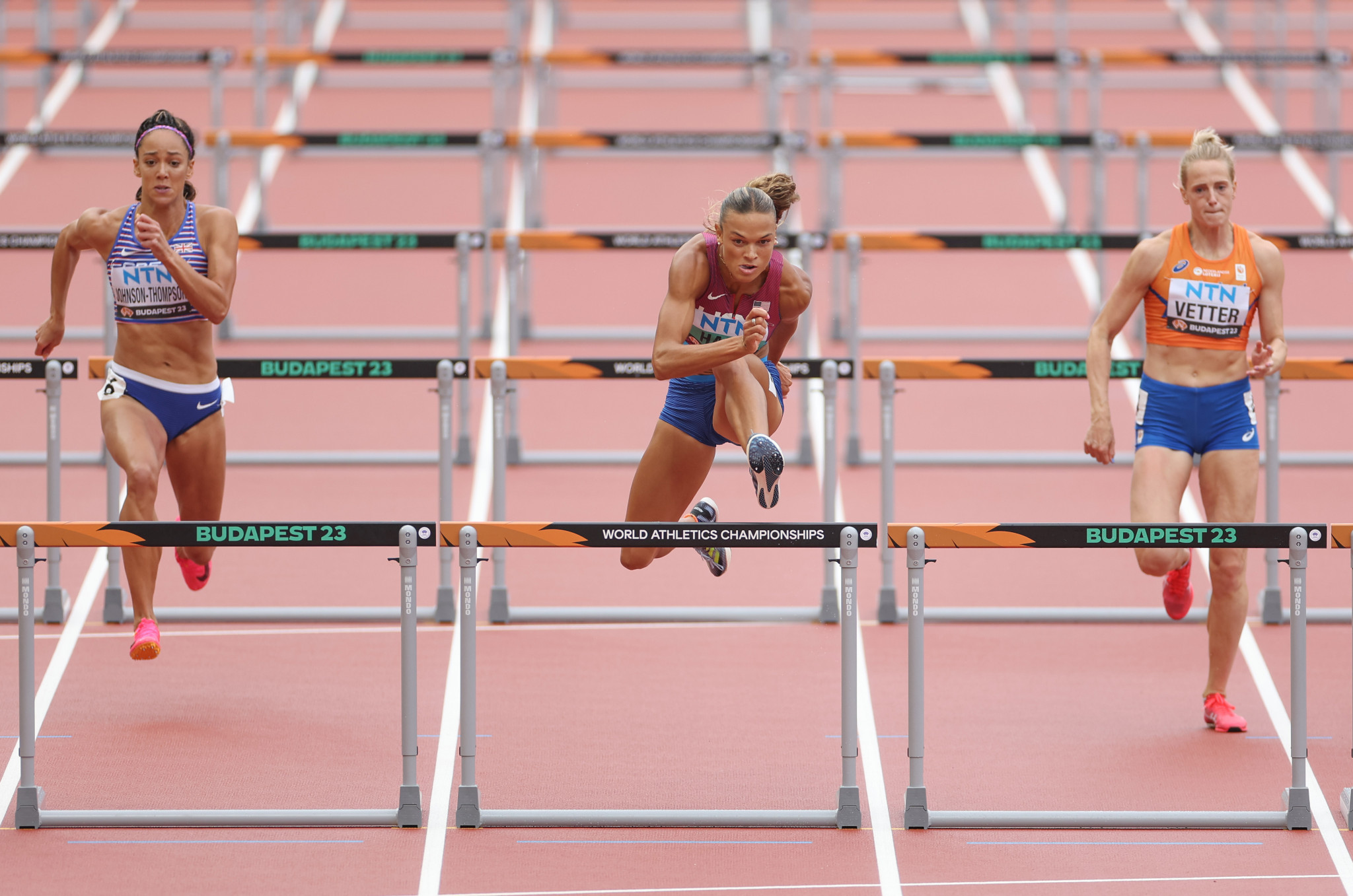 Anna Hall of the US, centre, leads Britain's Katarina Johnson-Thompson, left, by 93 points after four of the seven events in the heptathlon ©Getty Images