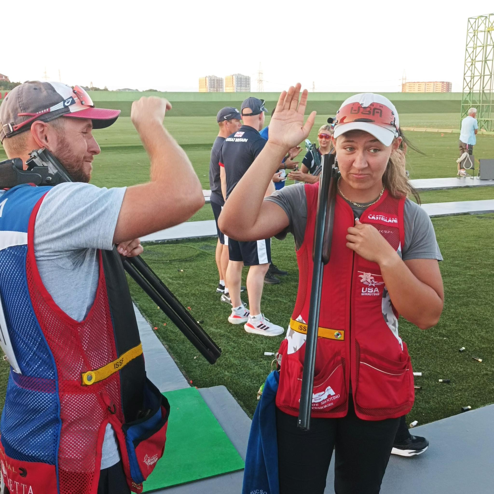 Vincent Hancock, left, paid tribute to the shooting of team mate Austen Smith in the mixed team skeet final ©ITG