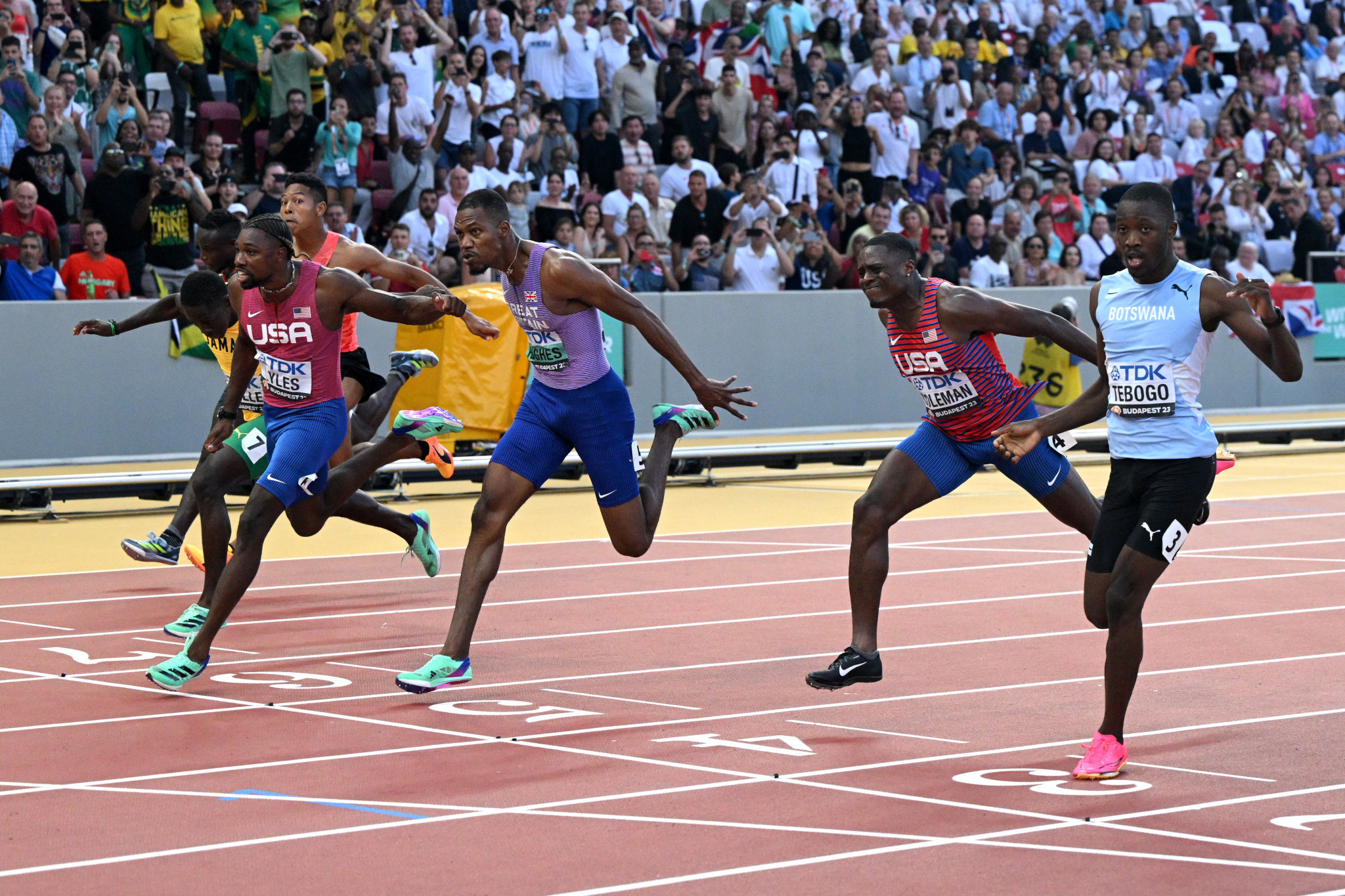 Noah Lyles of the US, third left, won the men's 100m final in 9.83sec, and there was an incredibly tight battle for second and third in which Botswana's Letsile Tebogo, right, took silver and Britain's Zharnel Hughes, third right, bronze ©Getty Images