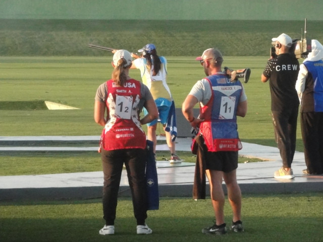 Austen Smith and Vincent Hancock watching their opponents shooting during last night's skeet mixed team gold medal match in Baku ©ITG