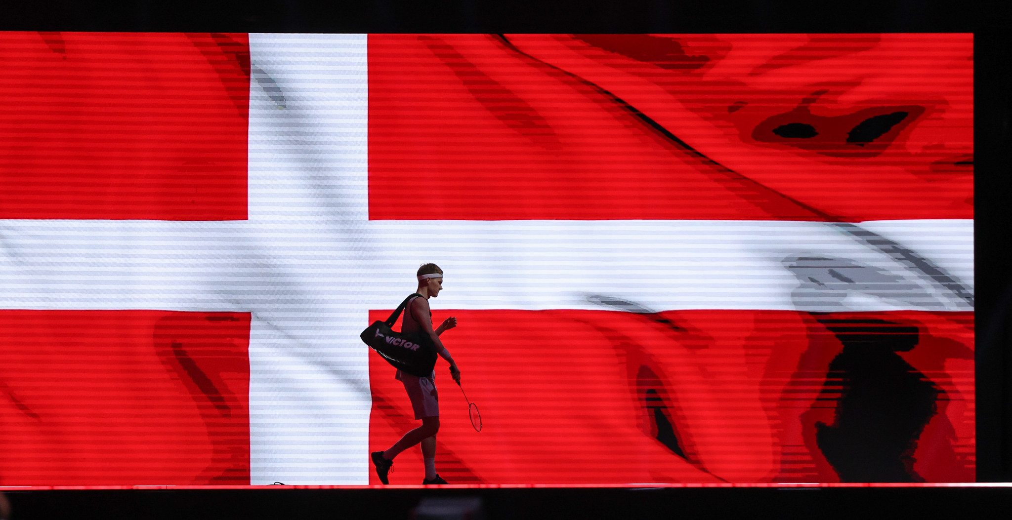 Denmark's Anders Antonsen appears in front of the national flag as he opens his account in Copenhagen ©Badmintonphoto