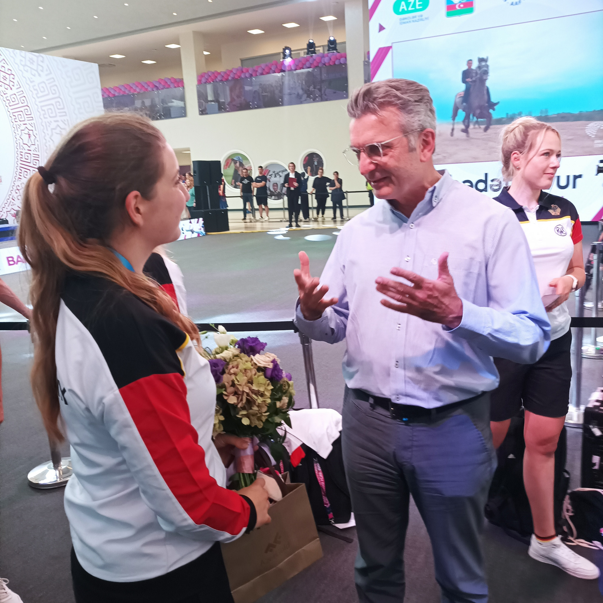 Doreen Vennekamp, left, gold medallist in 25 metre pistol has a new fan in German Ambassador Ralf Horlemann ©ITG