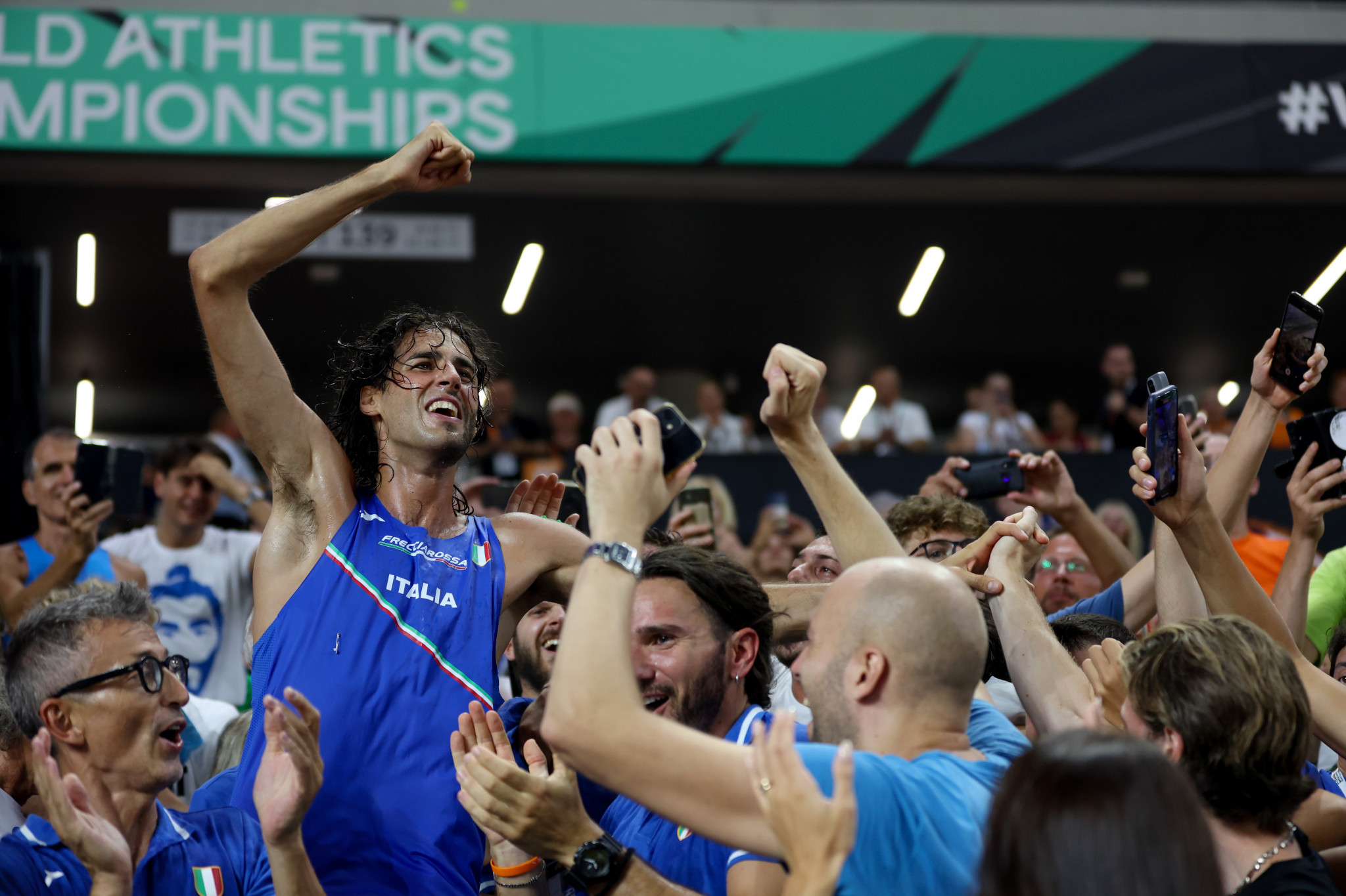 Gianmarco Tamberi of Italy, left, enjoyed vocal support throughout the men's high jump competition in Budapest ©Getty Images