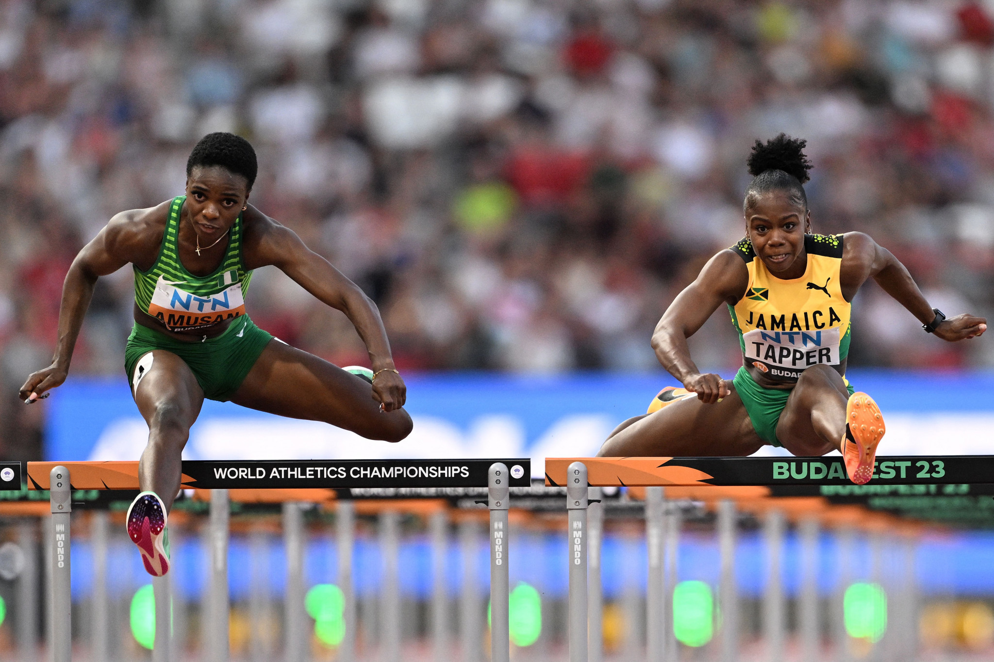 Nigeria's defending champion Tobi Amusan, left, was only cleared of an alleged anti-doping rule violation on Thursday (August 17), but won her 100m hurdles heat in Budapest ©Getty Images
