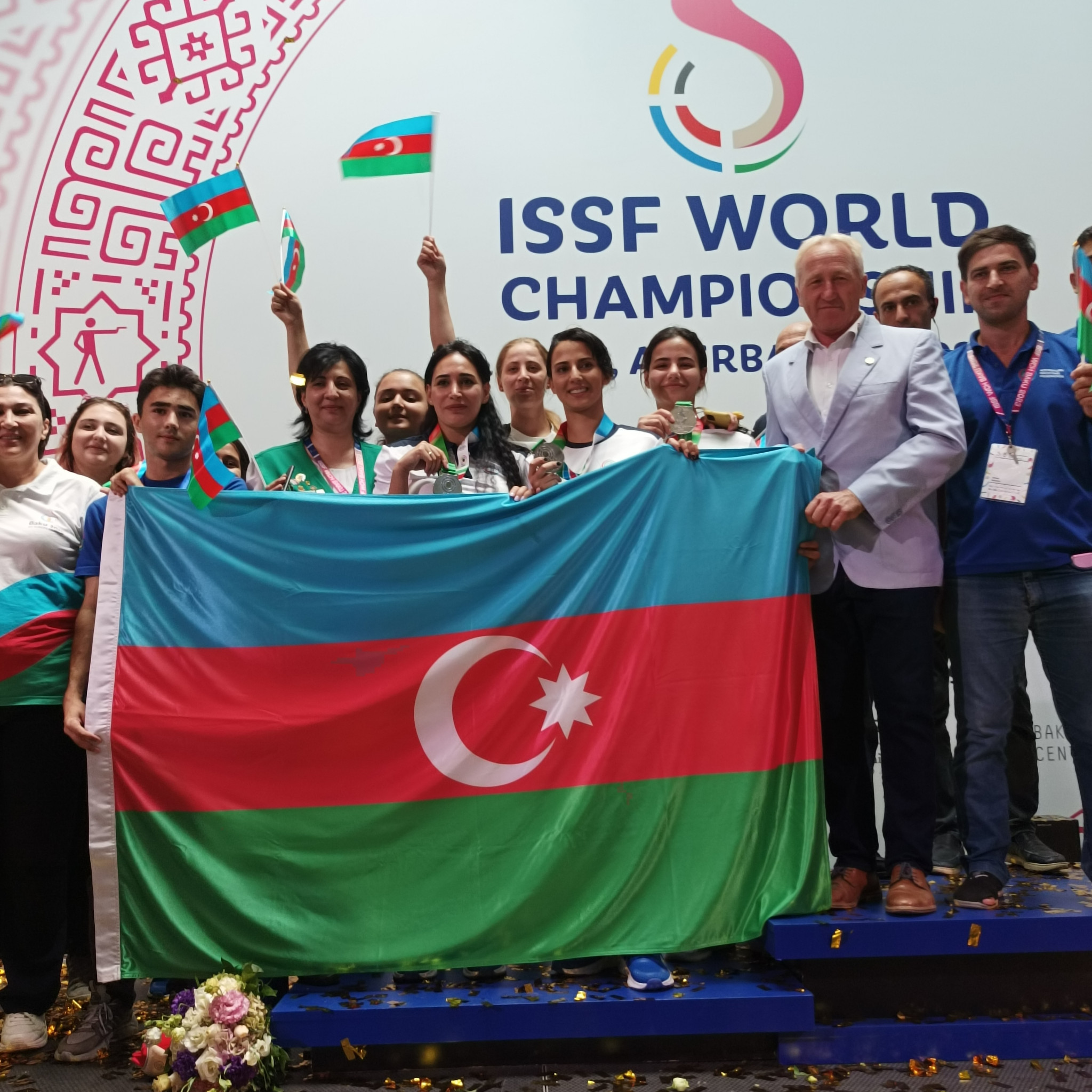 Azerbaijan's first medal of the ISSF World Championships prompted celebrations on the podium ©ITG