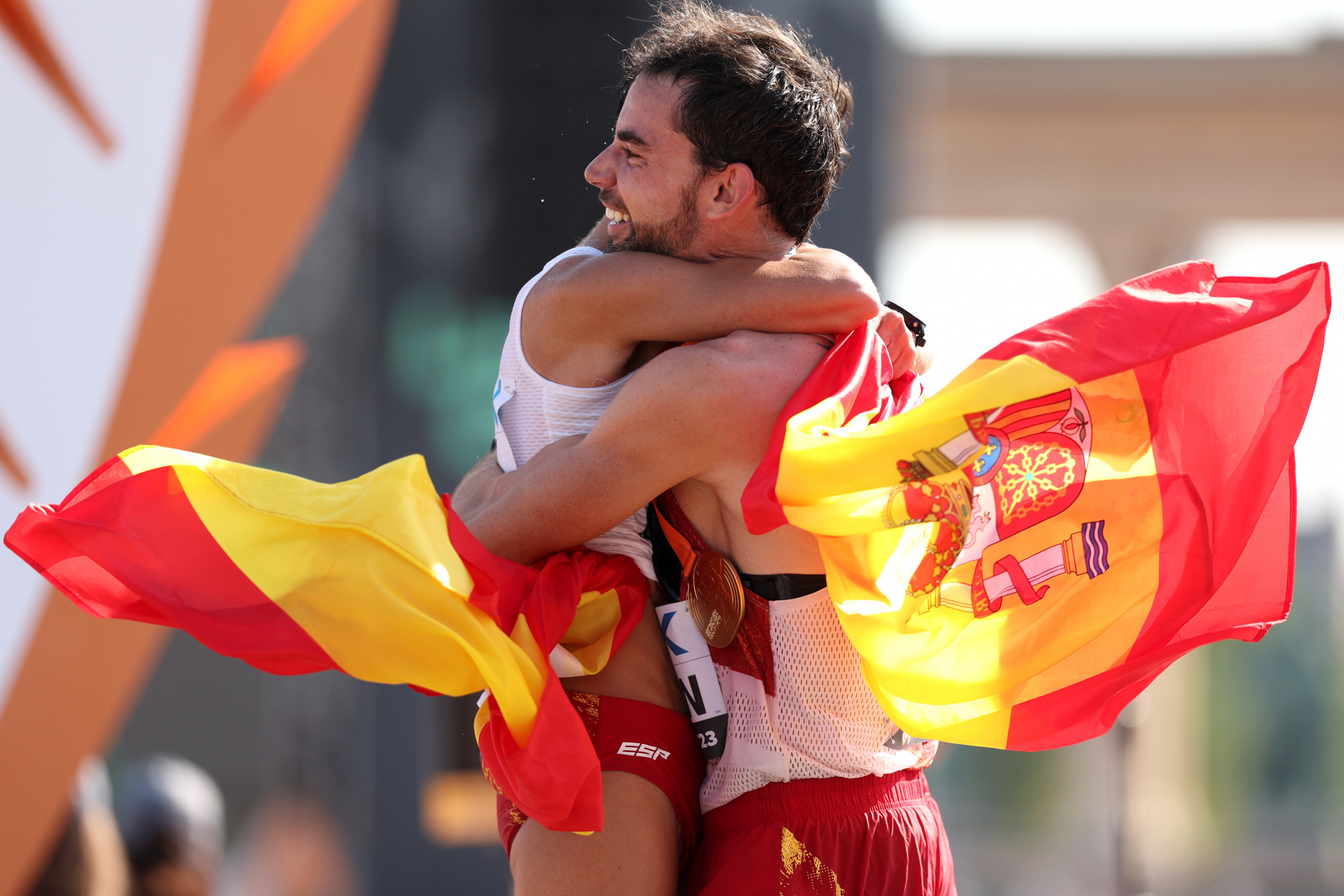 Spain's María Pérez, left, and Álvaro Martín, right, both celebrated completing 20 kilometres and 35km race walk doubles in the women's and men's competitions respectively ©Getty Images