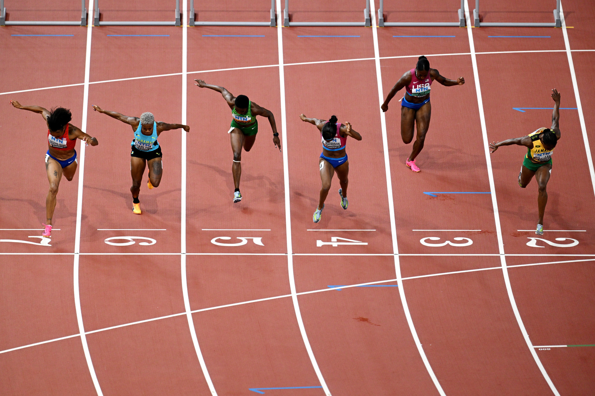 Danielle Williams of Jamaica, right, was a surprise winner from lane two in the 100m hurdles final ©Getty Images