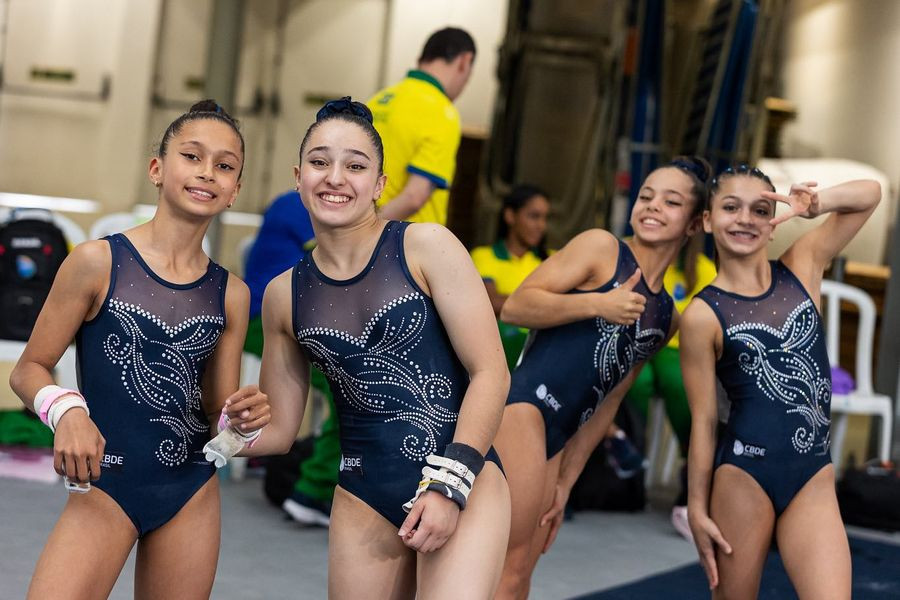 Athletes share a light moment during gymnastics events ©ISF