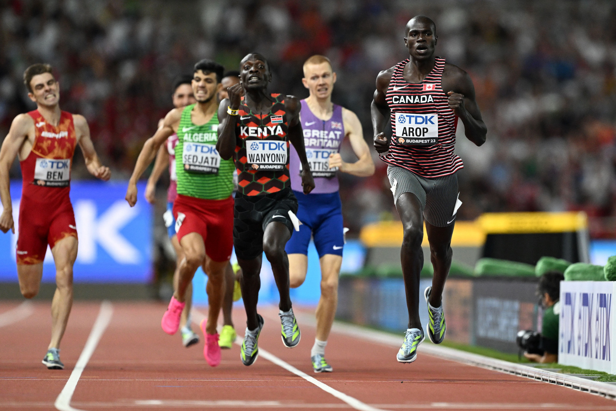 Canada's Marco Arop, right, triumphed in the men's 800m final to upgrade his bronze from last year ©Getty Images