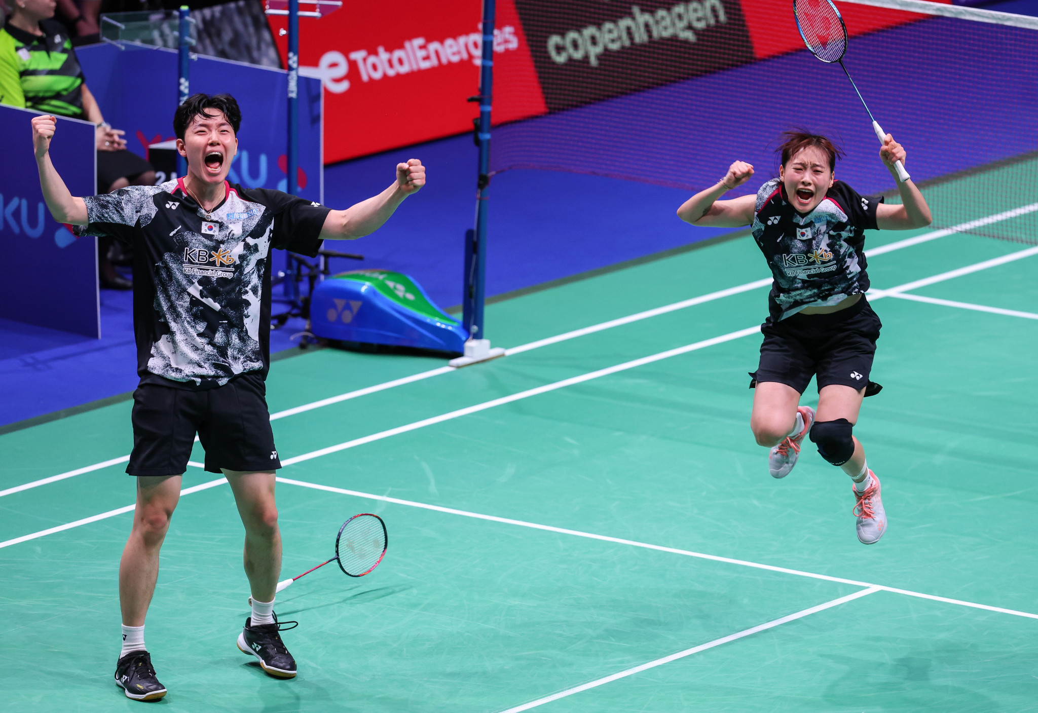 South Korea's Seo Seung-jae, left, and Chae Yu-jung, right, jump for joy after clinching mixed doubles gold ©Badmintonphoto
