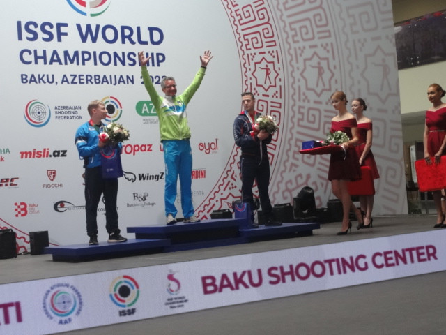 On the podium again at 60, Slovenia's Rajmond Debevic won gold in the men's 300m prone rifle ©ITG 