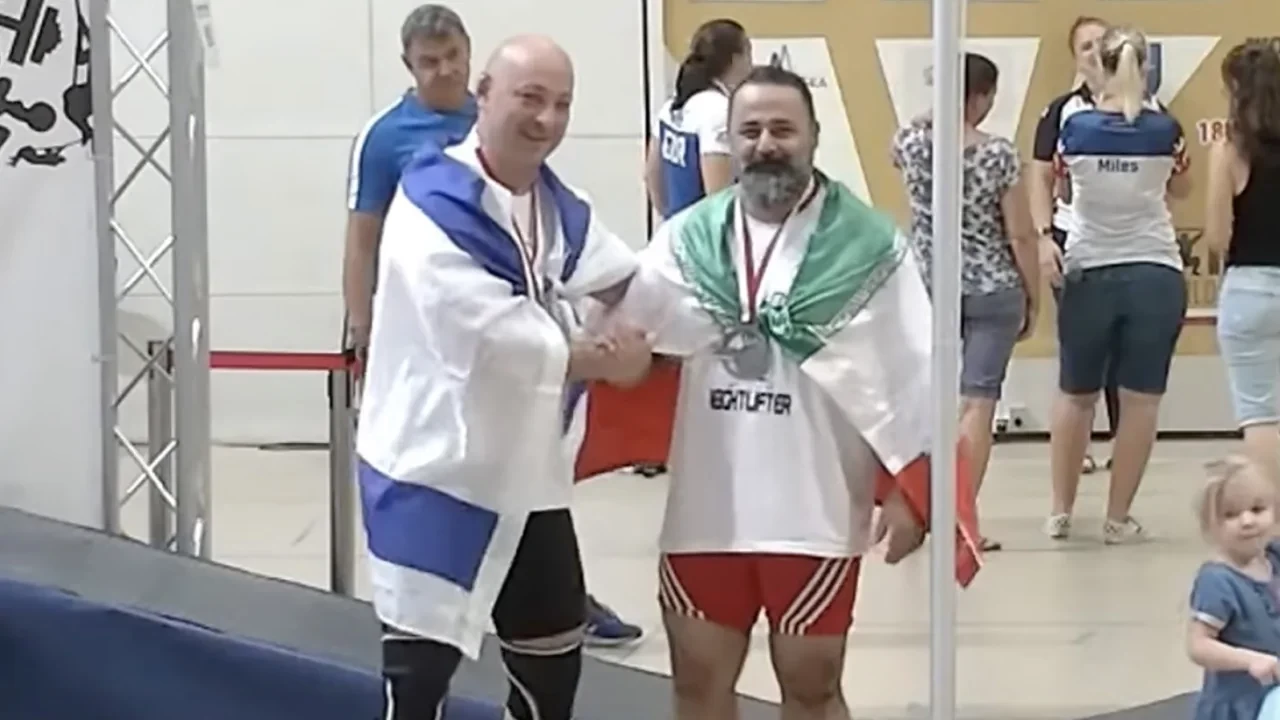 Iranian weightlifter banned for life after shaking hands with Israeli competitor
