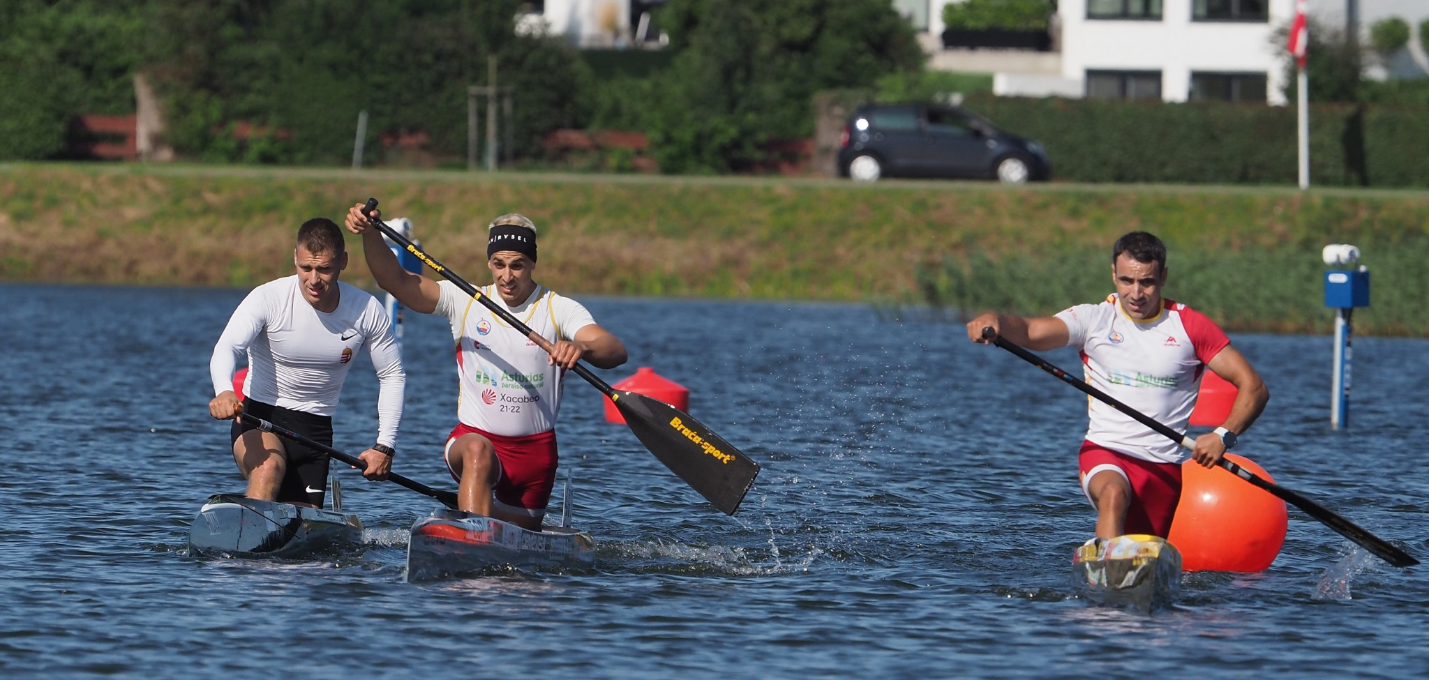 There was a three-way battle for much of the men's C1 race with Hungary's Marton Kover, left and Spanish duo Manuel Garrido, centre, and Manuel Campos, right, competing for top spot ©Søren Wilhelmsen/2023 ICF Canoe Marathon World Championships, Denmark