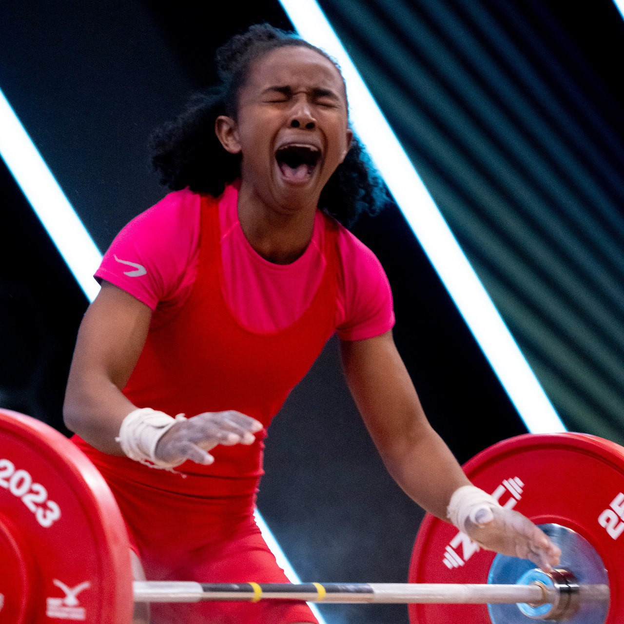 Rosina Randafiarison screamed with delight after her historic performance at the IWF World Championships ©IWF