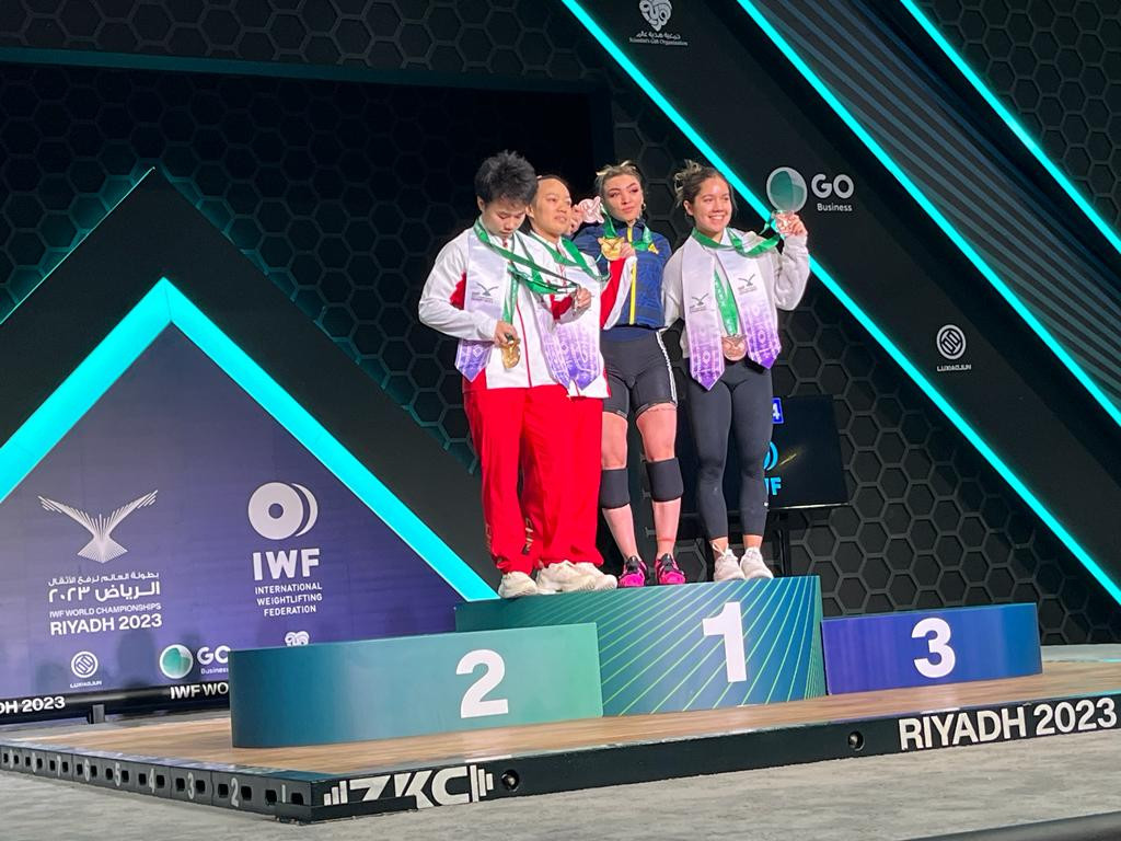 The podium for the women's 49kg category at the Prince Faisal bin Fahd Olympic Complex ©IWF