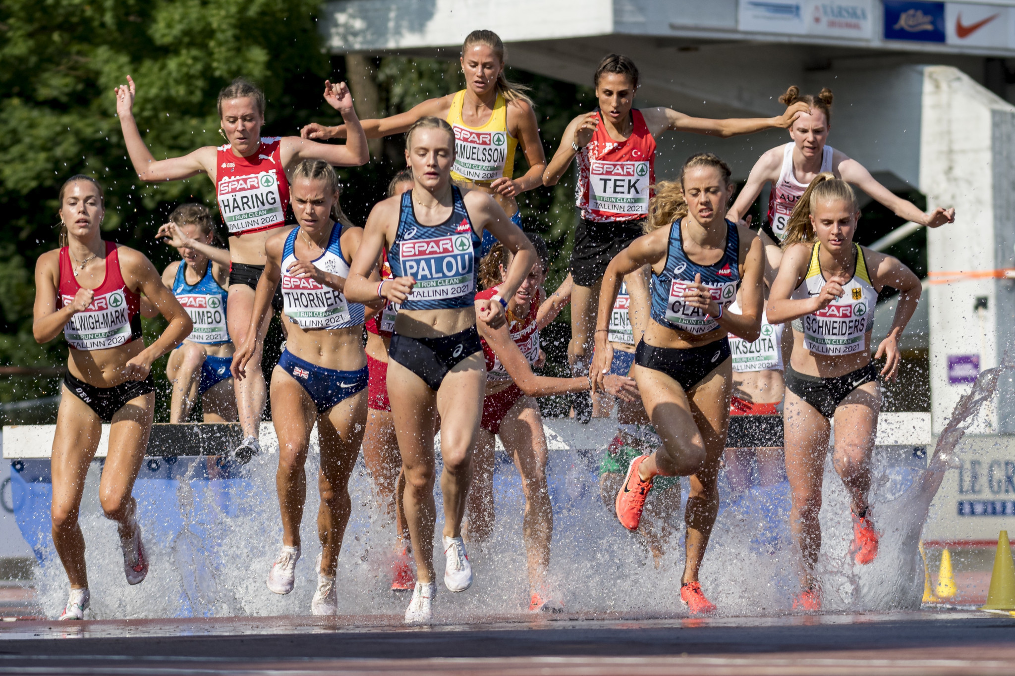 French steeplechase athlete Claire Palou, centre, has called for the 