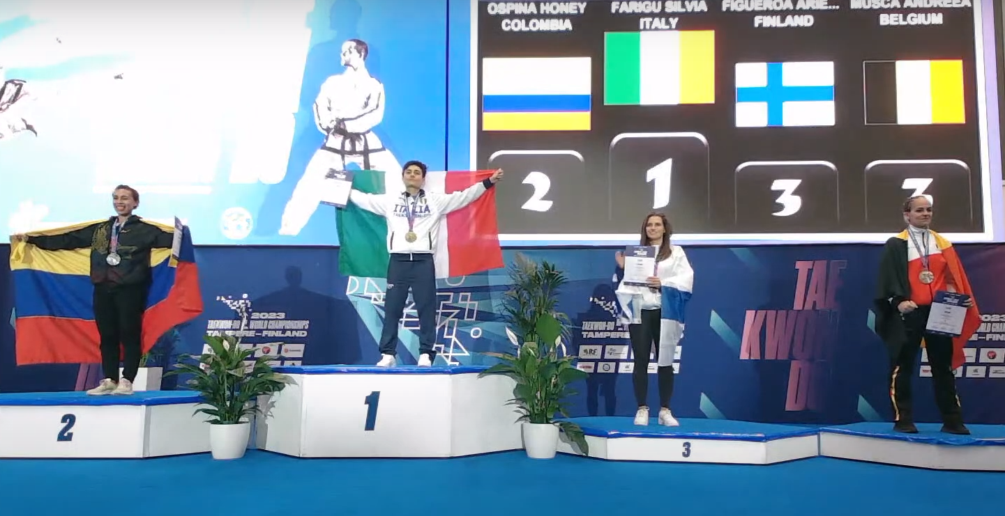 Italy were among the nations who won their first gold medal at the ITF World Championships on day two through Silvia Farigu, centre, in the women's patterns fourth to six dan event ©ITG