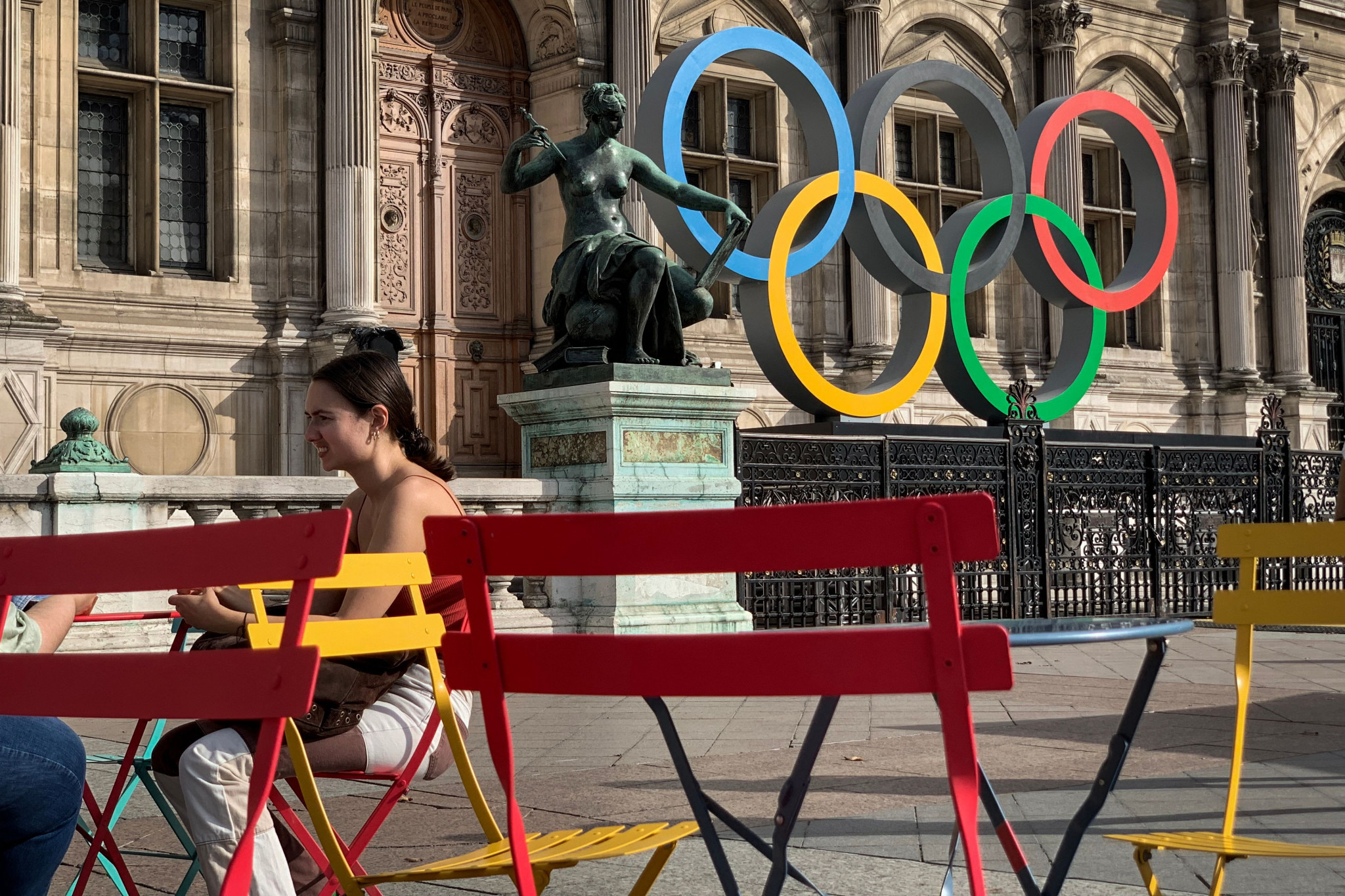 The Olympic rings at the Hôtel de Ville, the city hall, are one of the few visible signs that Paris is preparing to host the Olympics for the first time in 100-years ©Getty Images