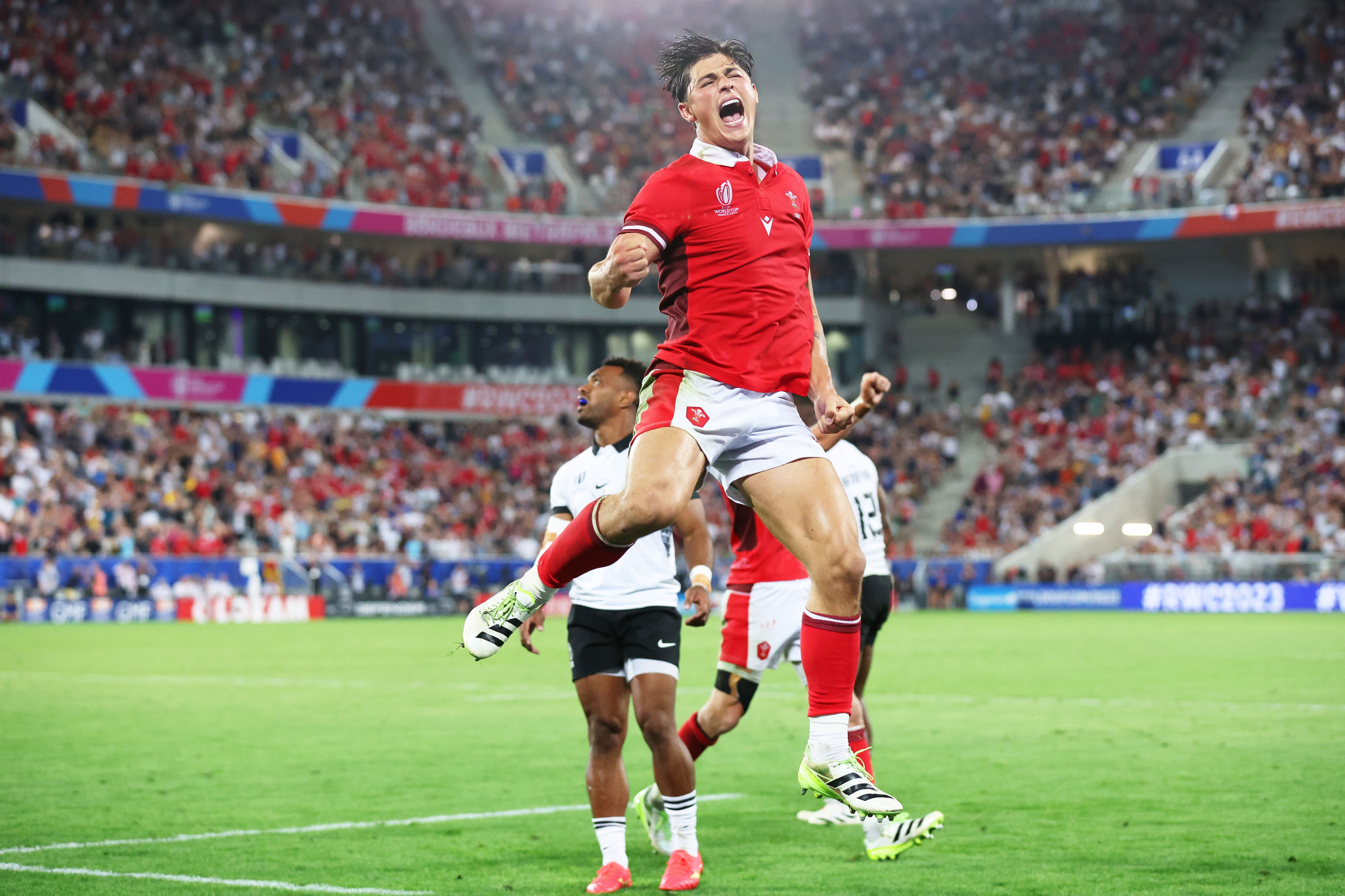 Wales withstand late Fiji fightback to win Rugby World Cup opener