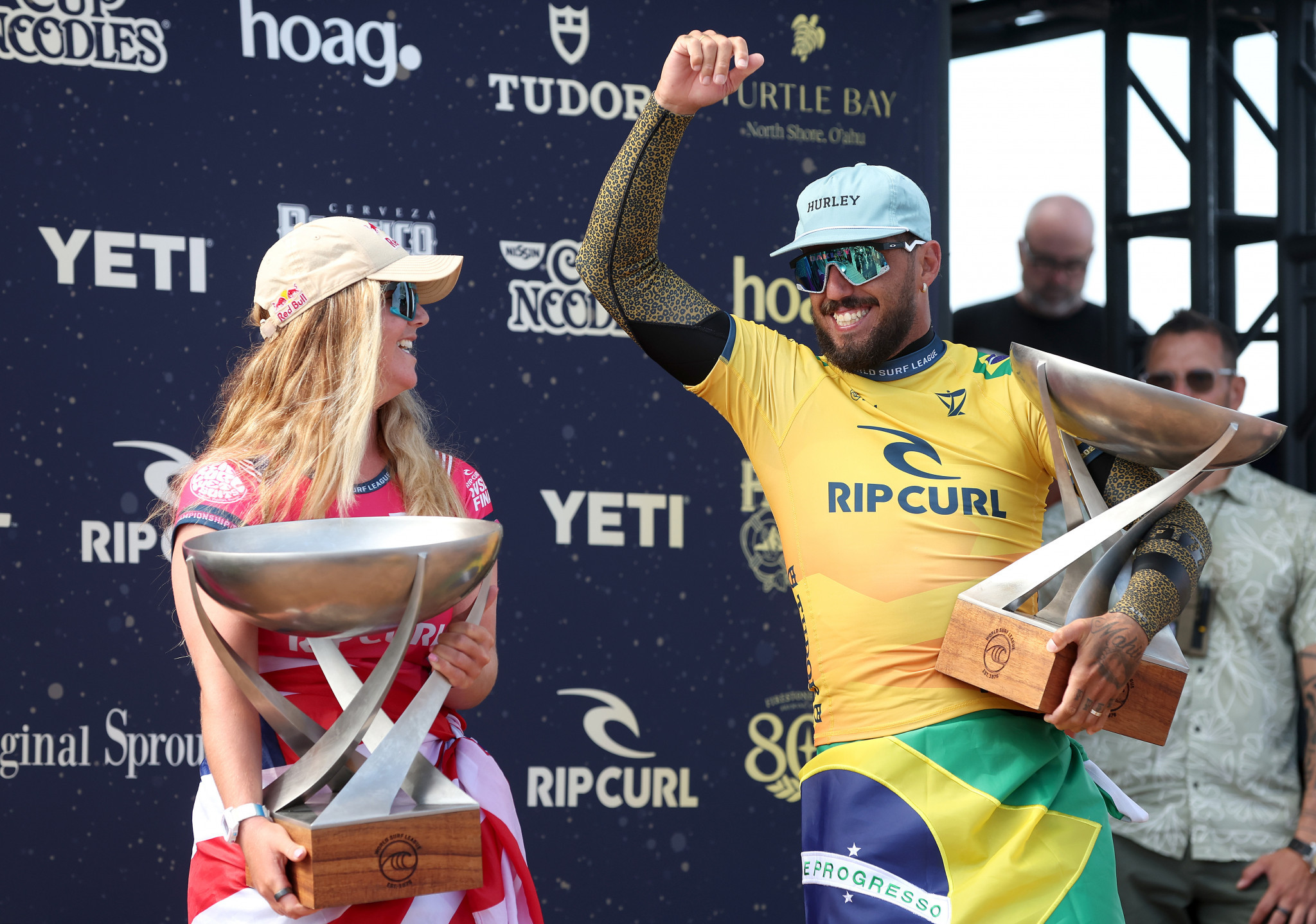 Brazil's Filipe Toledo, right, defended his men's title on the WSL while Caroline Marks of the US, left, earned the women's crown ©Getty Images