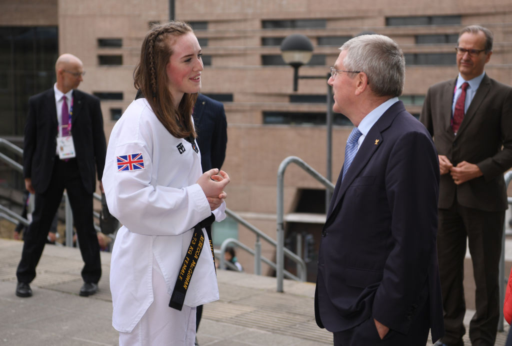 Two-time world medallist Rebecca McGowan, pictured meeting IOC President Thomas Bach at the 2019 World Taekwondo Championships, is contesting the Paris 2024 heavyweight place with three-times world champion Bianca Cook ©Getty Images