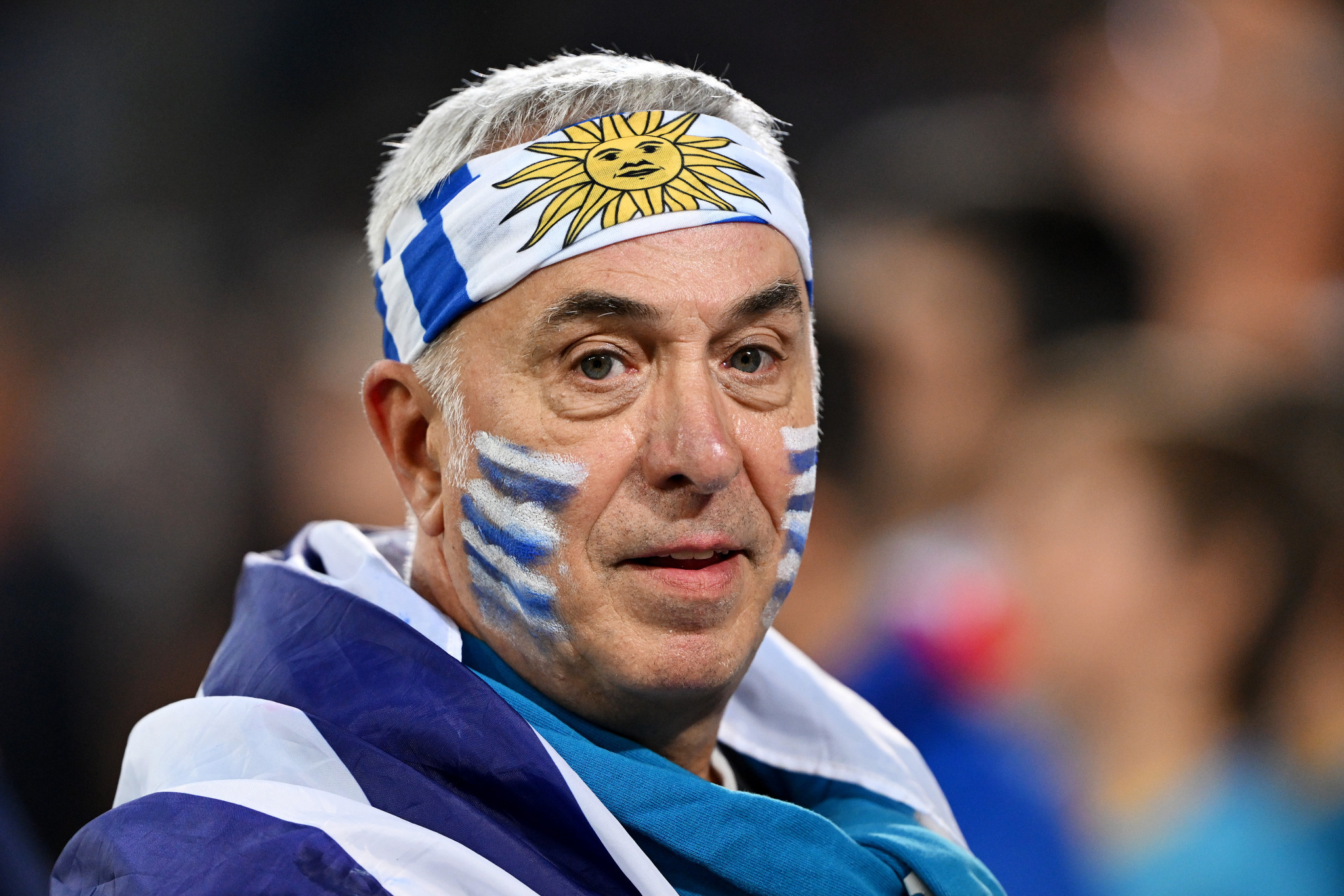 This Uruguayan fan was suitably dressed for the occasion, with the team doing their supporters proud ©Getty Images