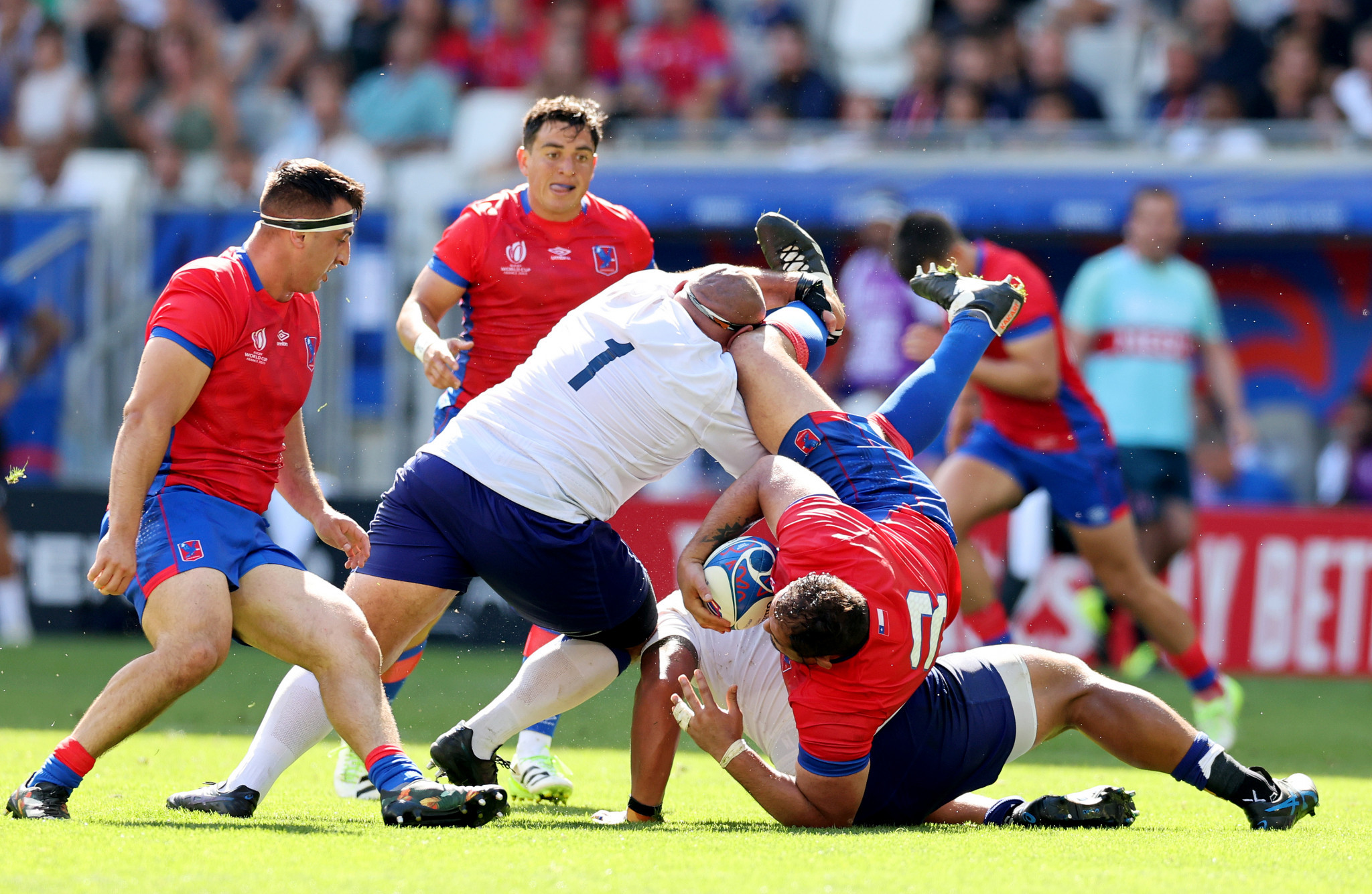 Matias Dittus, being tackled, helped Chile take the lead ©Getty Images